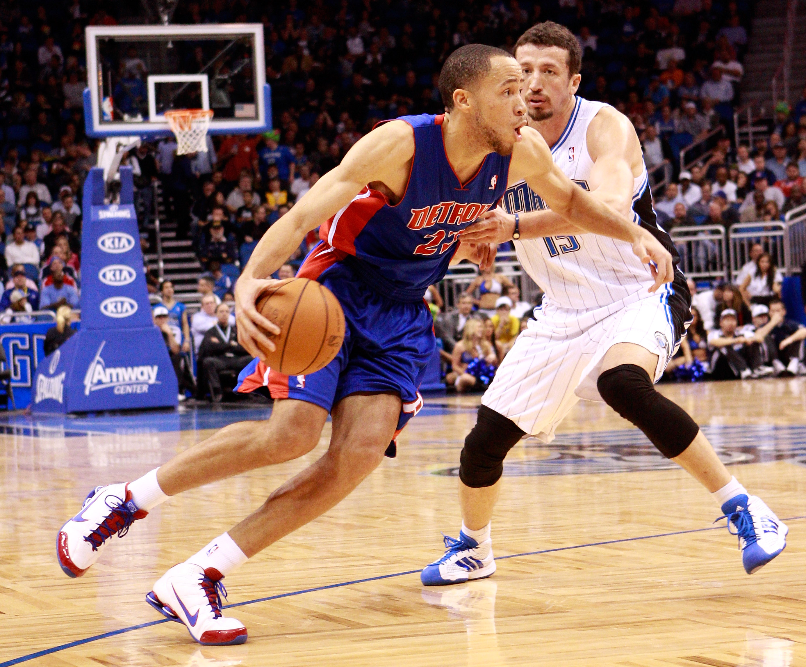 ORLANDO, FL - JANUARY 24:  Tayshaun Prince #22 of the Detroit Pistons drives against Hedo Turkoglu #15 of the Orlando Magic during the game at Amway Arena on January 24, 2011 in Orlando, Florida.  NOTE TO USER: User expressly acknowledges and agrees that,
