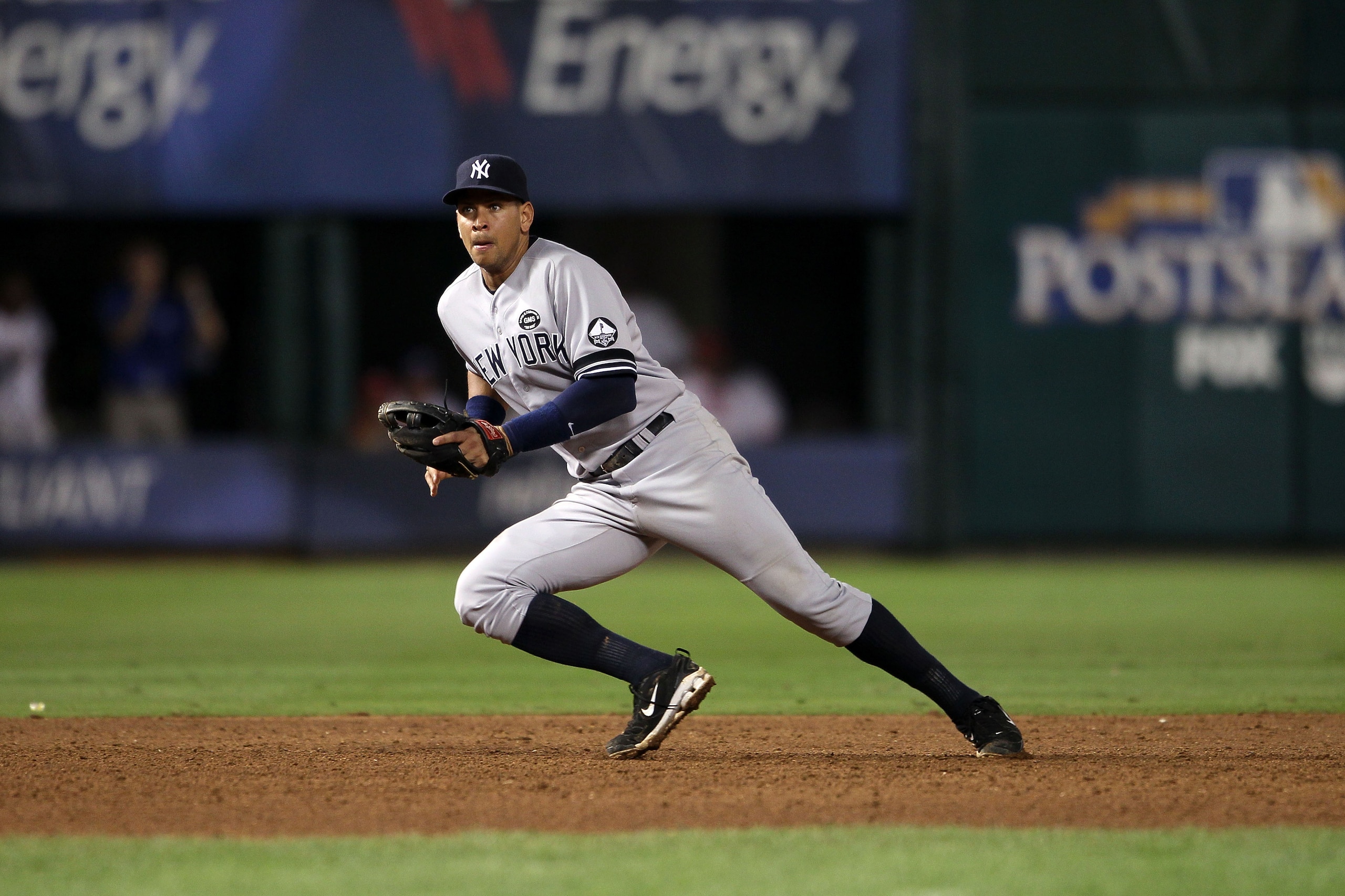 ARLINGTON, TX - OCTOBER 22:  Alex Rodriguez #13 of the New York Yankees makes a play for a ball on defense against the Texas Ranger in Game Six of the ALCS during the 2010 MLB Playoffs at Rangers Ballpark in Arlington on October 22, 2010 in Arlington, Tex