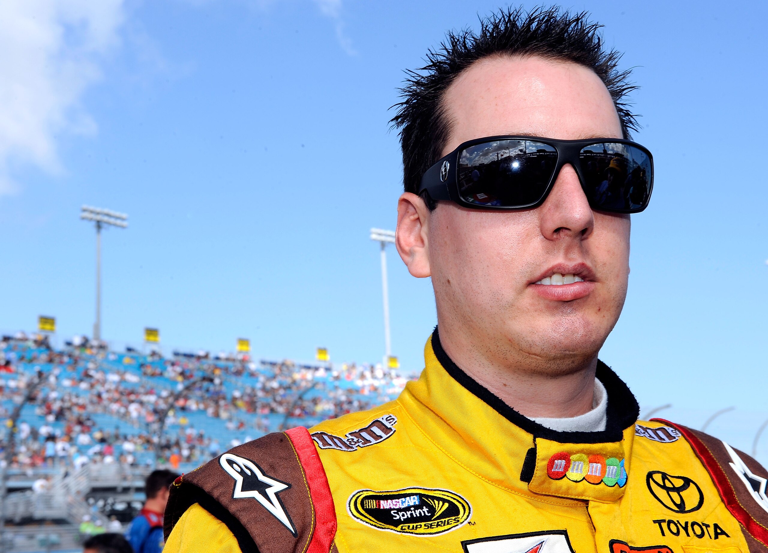 HOMESTEAD, FL - NOVEMBER 21:  Kyle Busch, driver of the #18 M&M's Toyota, stands on pit road prior to the NASCAR Sprint Cup Series Ford 400 at Homestead-Miami Speedway on November 21, 2010 in Homestead, Florida.  (Photo by Rusty Jarrett/Getty Images for N