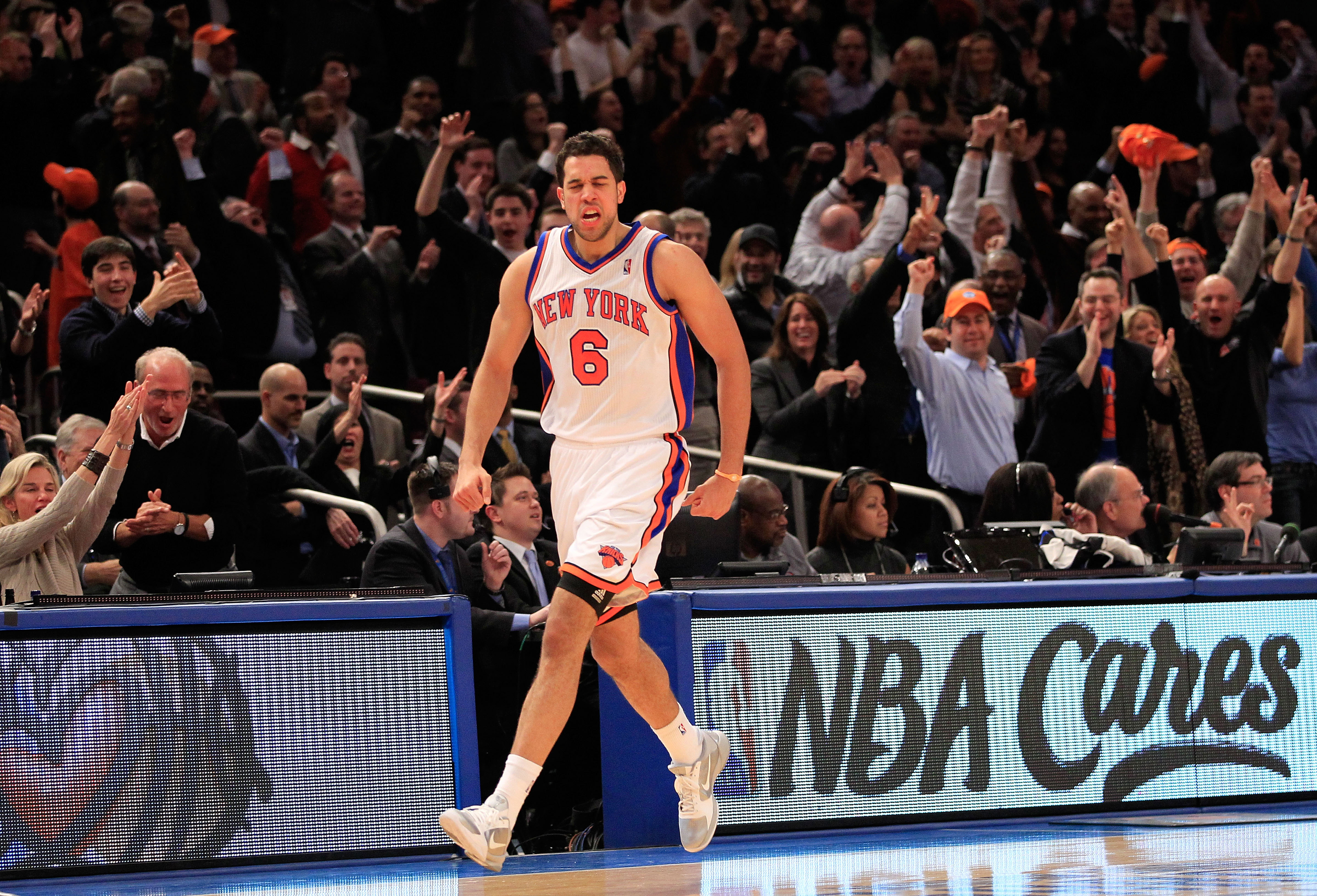 NEW YORK, NY - JANUARY 27: Landry Fields #6 of the New York Knicks celebrates scoring a three pointer against the Miami Heat at Madison Square Garden on January 27, 2011 in New York City. NOTE TO USER: User expressly acknowledges and agrees that, by downl