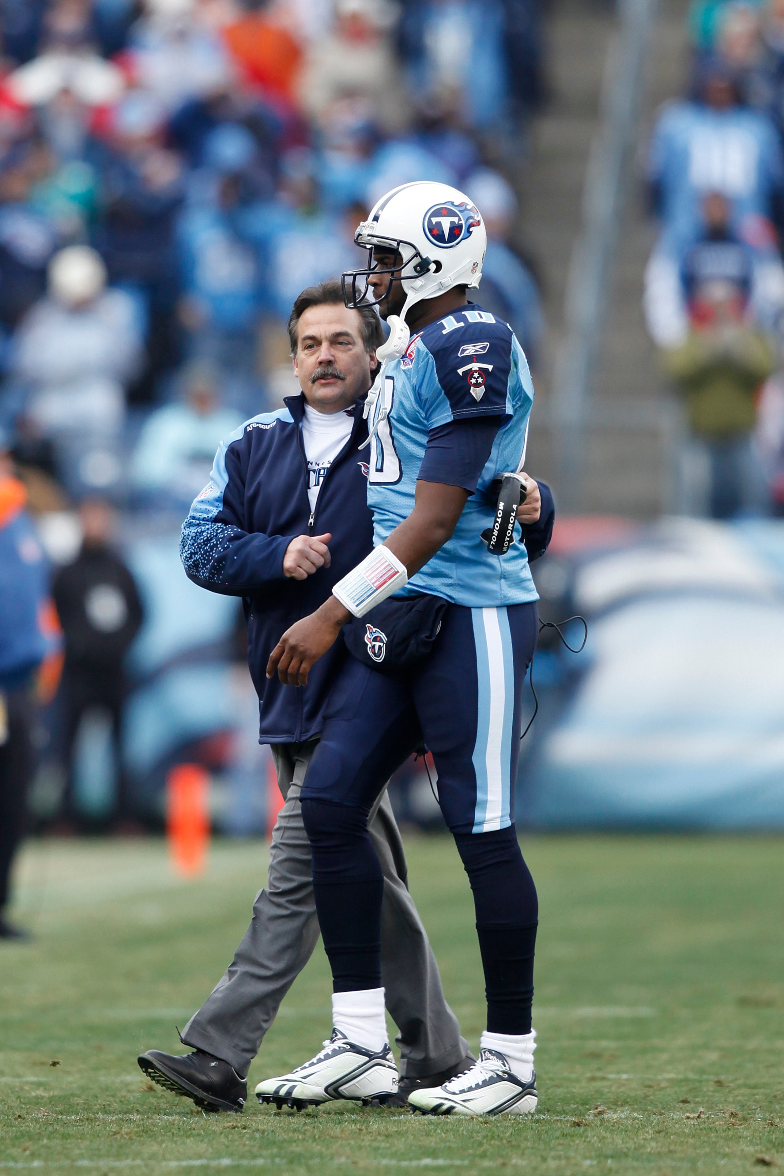 NASHVILLE, TN - DECEMBER 20: Head coach Jeff Fisher of the Tennessee Titans talks with Vince Young #10 after he threw a touchdown pass against the Miami Dolphins at LP Field on December 20, 2009 in Nashville, Tennessee. The Titans defeated the Dolphins 27 NASHVILLE, TN - DECEMBER 20: Head coach Jeff Fisher of the Tennessee Titans talks with Vince Young #10 after he threw a touchdown pass against the Miami Dolphins at LP Field on December 20, 2009 in Nashville, Tennessee. The Titans defeated the Dolphins 27