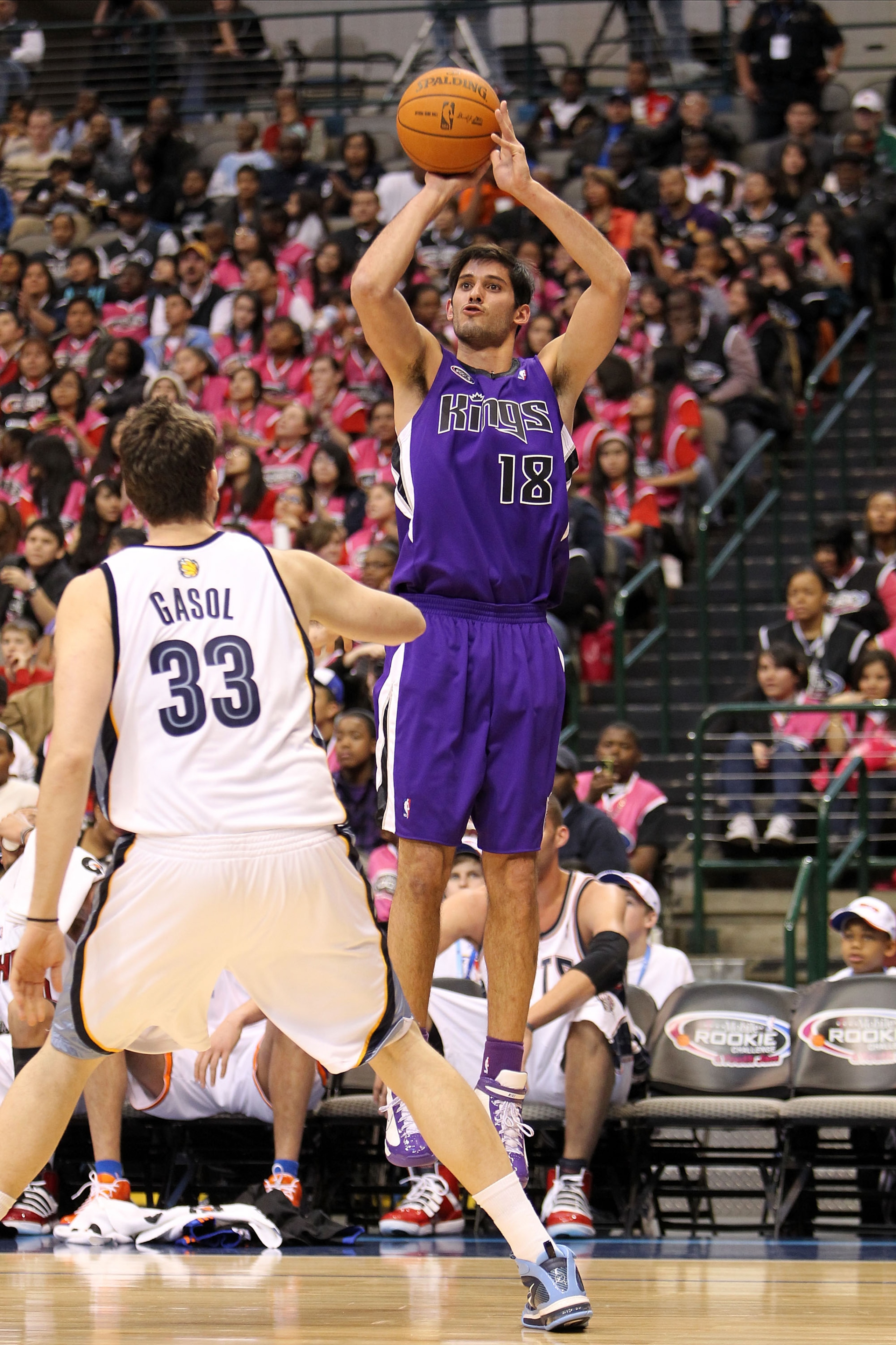 DALLAS - FEBRUARY 12:  Omri Casspi #18 of the Rookie team shoots against Marc Gasol #33 of the Sophomore team during the first half of the T-Mobile Rookie Challenge & Youth Jam part of 2010 NBA All-Star Weekend at American Airlines Center on February 12,