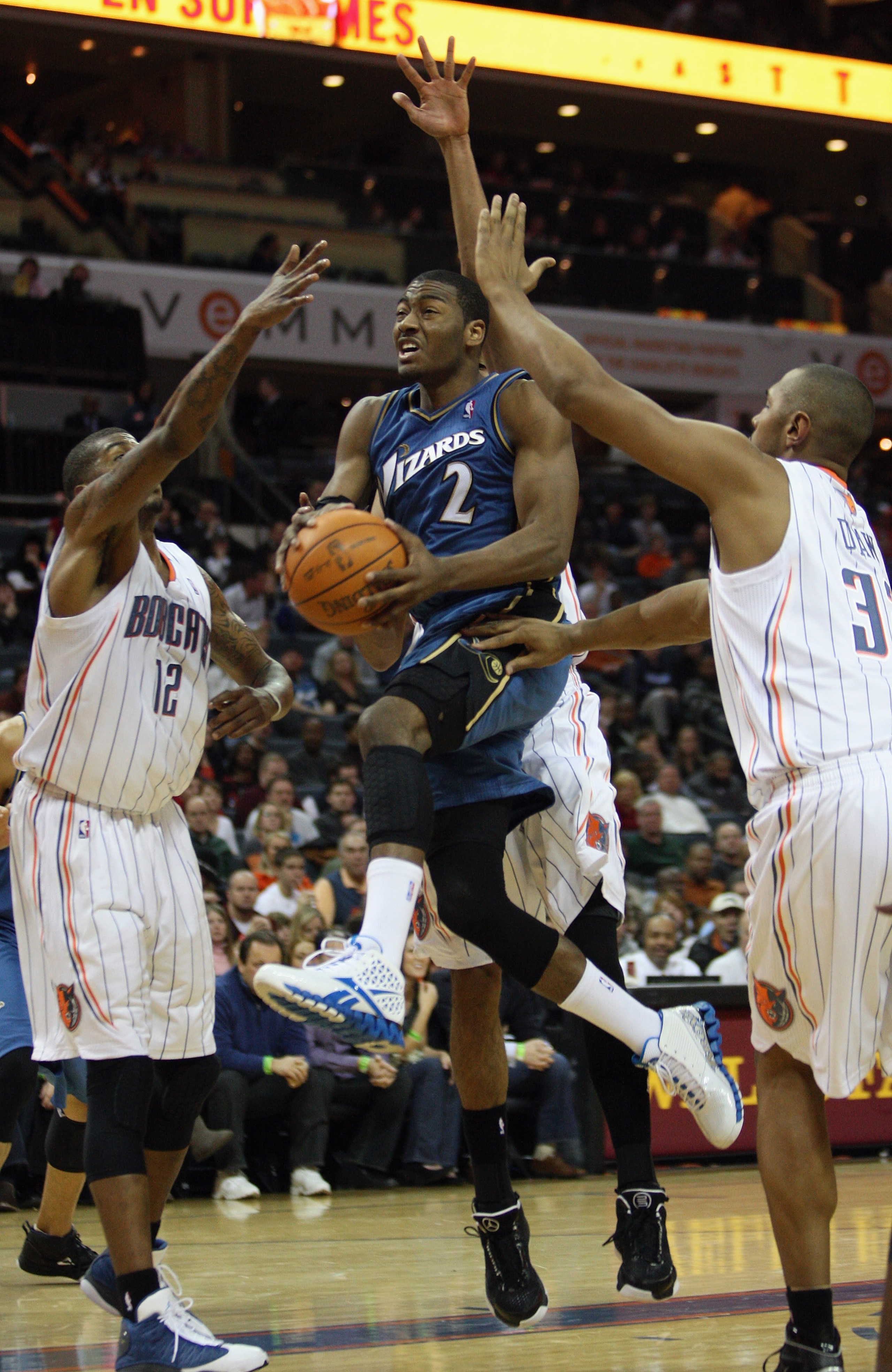 CHARLOTTE, NC - JANUARY 08:  John Wall #1 of the Washington Wizards drives to the basket against the Charlotte Bobcats during their game at Time Warner Cable Arena on January 8, 2011 in Charlotte, North Carolina. NOTE TO USER: User expressly acknowledges