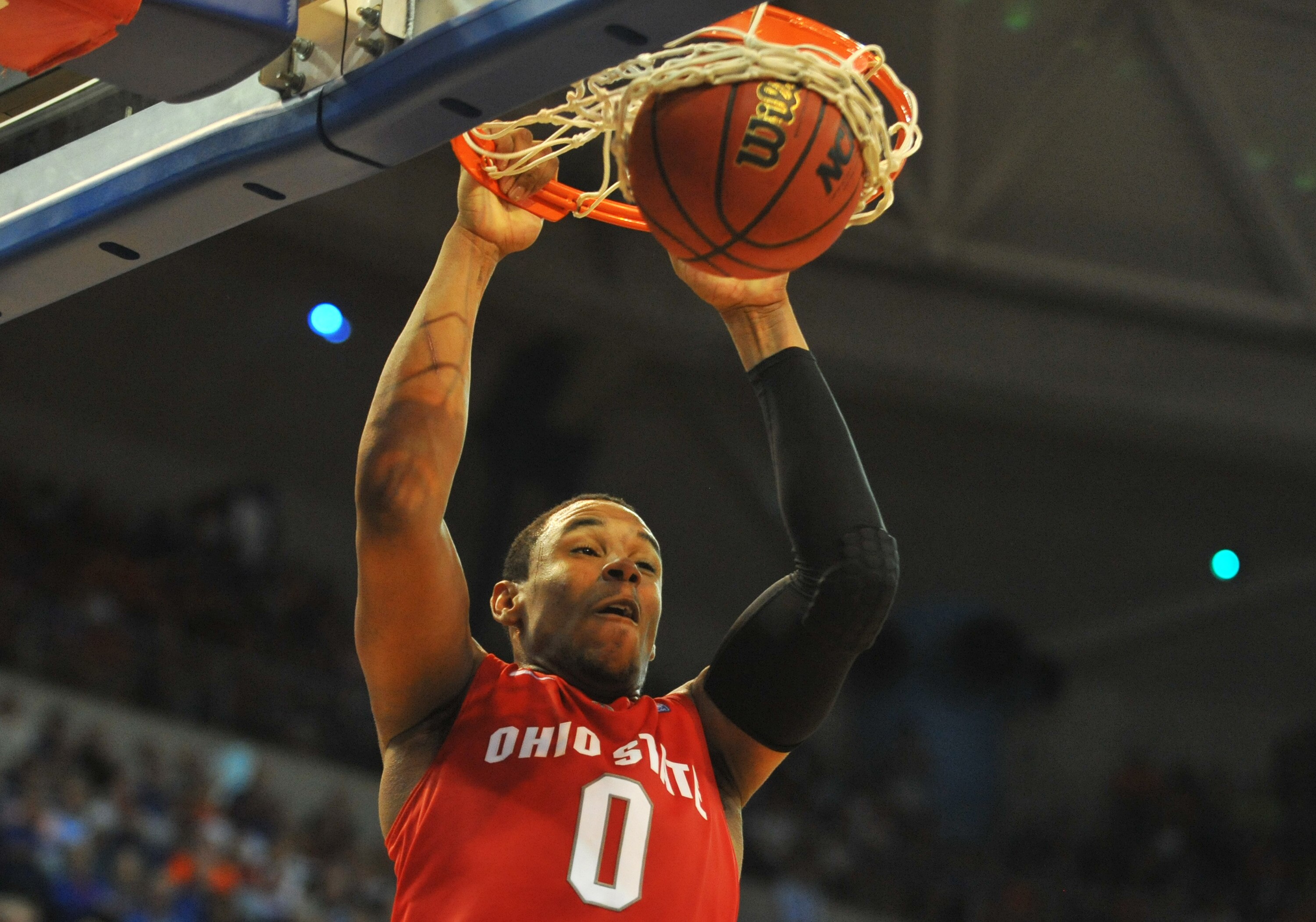 GAINESVILLE, FL - NOVEMBER 16: Forward Jared Sullinger #0 of the Ohio State Buckeyes scores against the Florida Gators November 16, 2010 at the Stephen C. O'Connell Center in Gainesville, Florida.  (Photo by Al Messerschmidt/Getty Images)