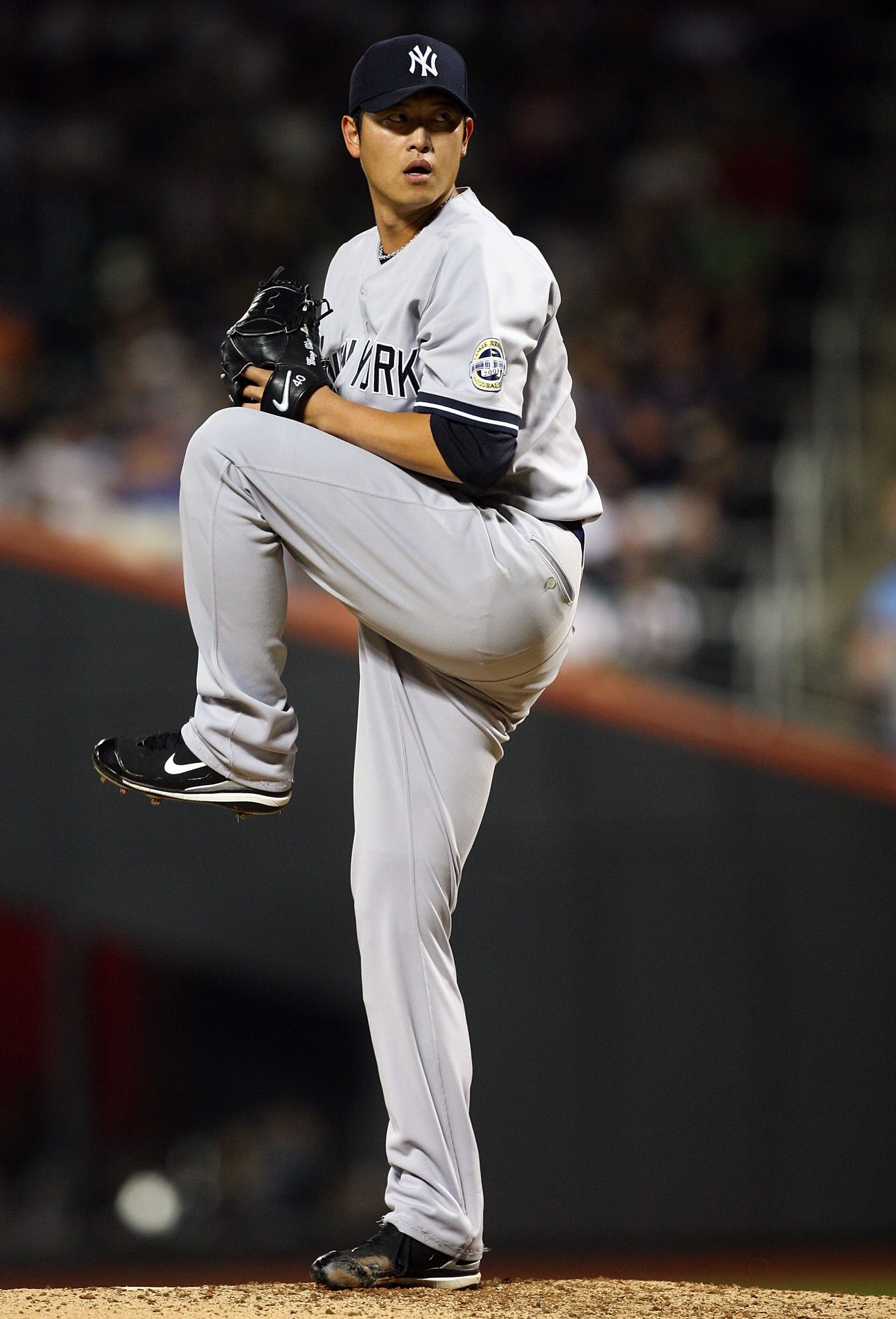 NEW YORK - JUNE 28: Chien-Ming Wang #40 of the New York Yankees pitches against the New York Mets on June 28, 2009 at Citi Field in the Flushing neighborhood of the Queens borough of New York City. (Photo by Jim McIsaac/Getty Images) NEW YORK - JUNE 28: Chien-Ming Wang #40 of the New York Yankees pitches against the New York Mets on June 28, 2009 at Citi Field in the Flushing neighborhood of the Queens borough of New York City. (Photo by Jim McIsaac/Getty Images)