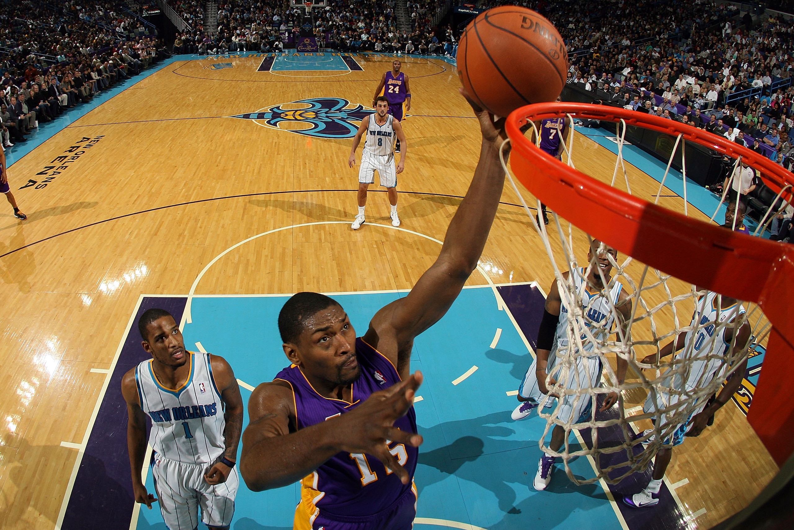 NEW ORLEANS, LA - DECEMBER 29: Ron Artest #15 of the Los Angeles Lakers shoots the ball over Trevor Ariza #1 of the New Orleans Hornets at the New Orleans Arena on December 29, 2010 in New Orleans, Louisiana.   The Lakers defeated the Hornets 103-88.  NOT