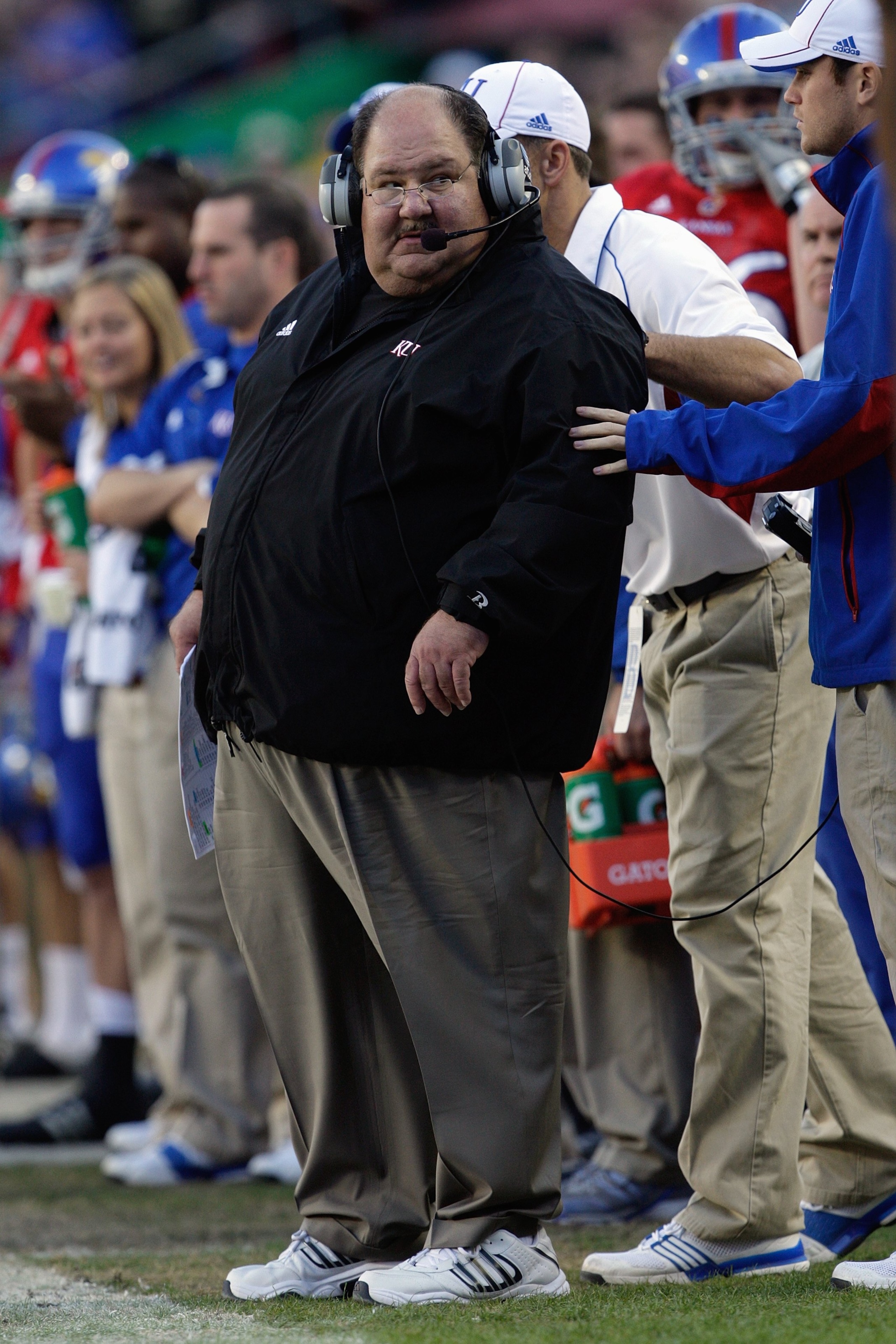 KANSAS CITY, MO - NOVEMBER 28:  Head coach Mark Mangino of the Kansas Jayhawks looks on during the game against the Missouri Tigers at Arrowhead Stadium on November 28, 2009 in Kansas City, Missouri. (Photo by Jamie Squire/Getty Images)
