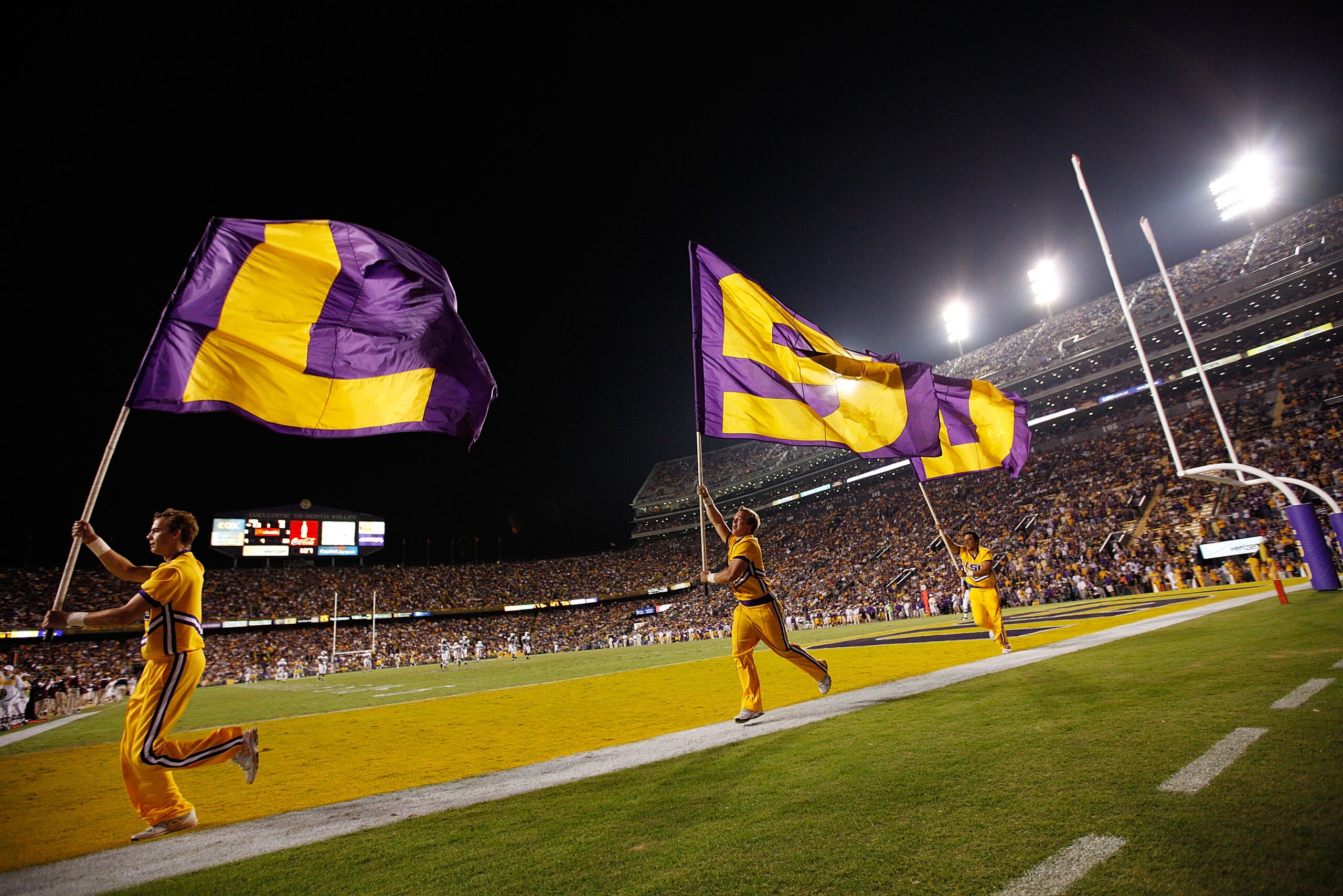 BATON ROUGE, LA - NOVEMBER 13:  Members of the Louisiana State University Tigers cheerleaders celebrate after a touchdown during the game against the University of Louisiana-Monroe Warhawks at Tiger Stadium on November 13, 2010 in Baton Rouge, Louisiana.
