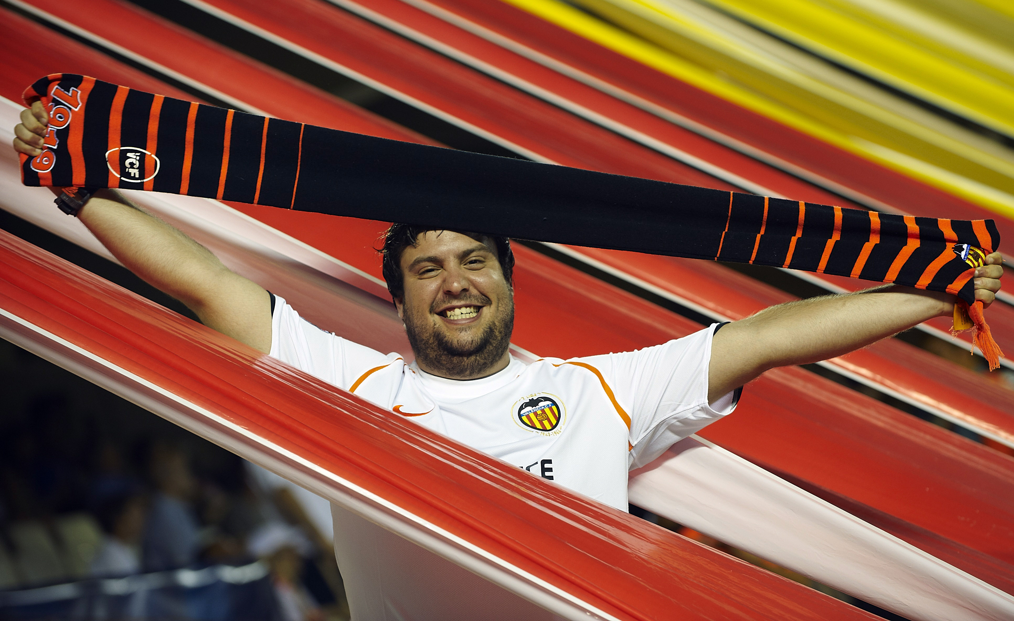 VALENCIA, SPAIN - SEPTEMBER 29: A Valencia fan celebrates during the UEFA Champions League group C match between Valencia and Manchester United on September 29, 2010 in Valencia, Spain. (Photo by Manuel Queimadelos Alonso/Getty Images)