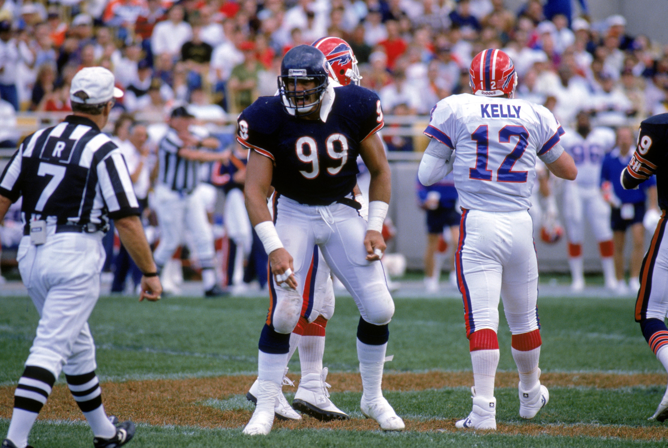 CHICAGO - OCTOBER 2:  Defensive tackle Dan Hampton #99 of the Chicago Bears argues a call with a referee after a play during the game against the Buffalo Bills at Soldier Field on October 2, 1988 in Chicago, Illinois.  The Bears won 24-3.  (Photo by Jonat