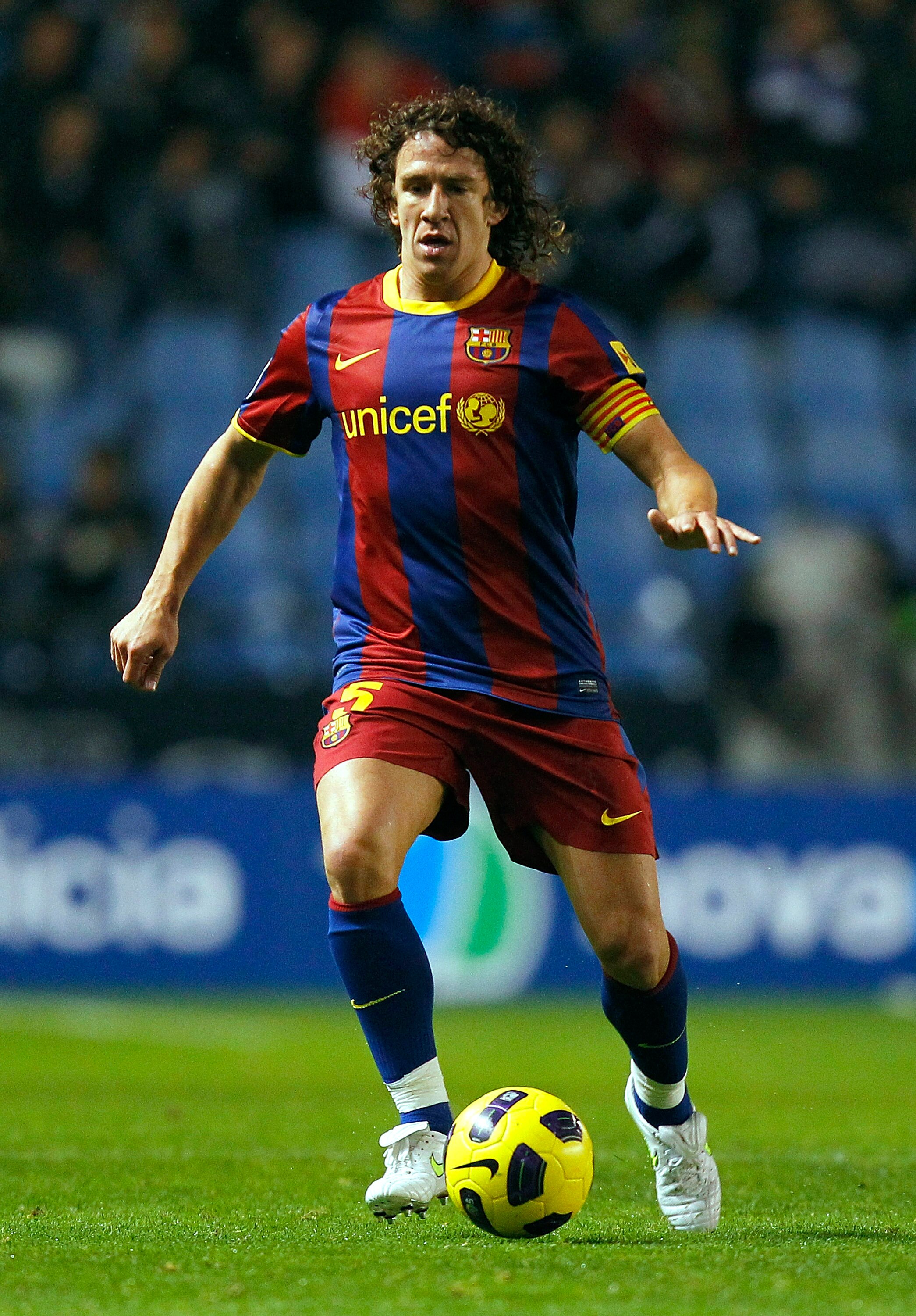 LA CORUNA, SPAIN - JANUARY 08: Carles Puyol of Barcelona in action during the La Liga match between Deportivo La Coruna and Barcelona at Riazor Stadium on January 8, 2011 in La Coruna, Spain.  (Photo by Angel Martinez/Getty Images)