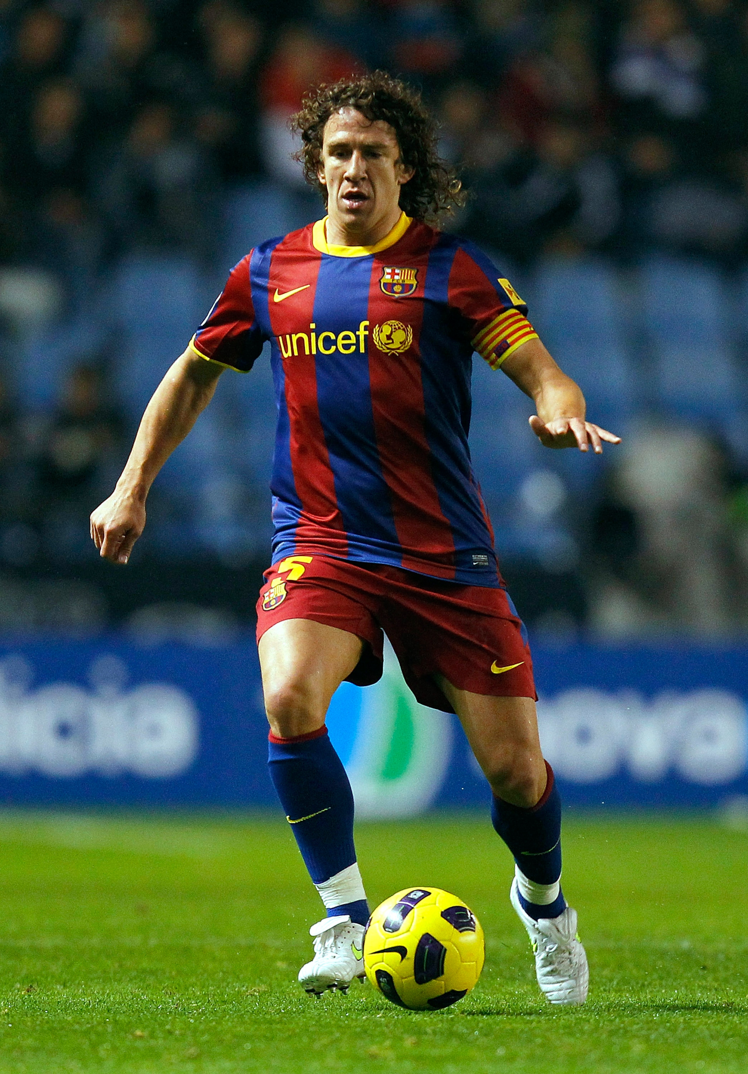 LA CORUNA, SPAIN - JANUARY 08: Carles Puyol of Barcelona in action during the La Liga match between Deportivo La Coruna and Barcelona at Riazor Stadium on January 8, 2011 in La Coruna, Spain.  (Photo by Angel Martinez/Getty Images)