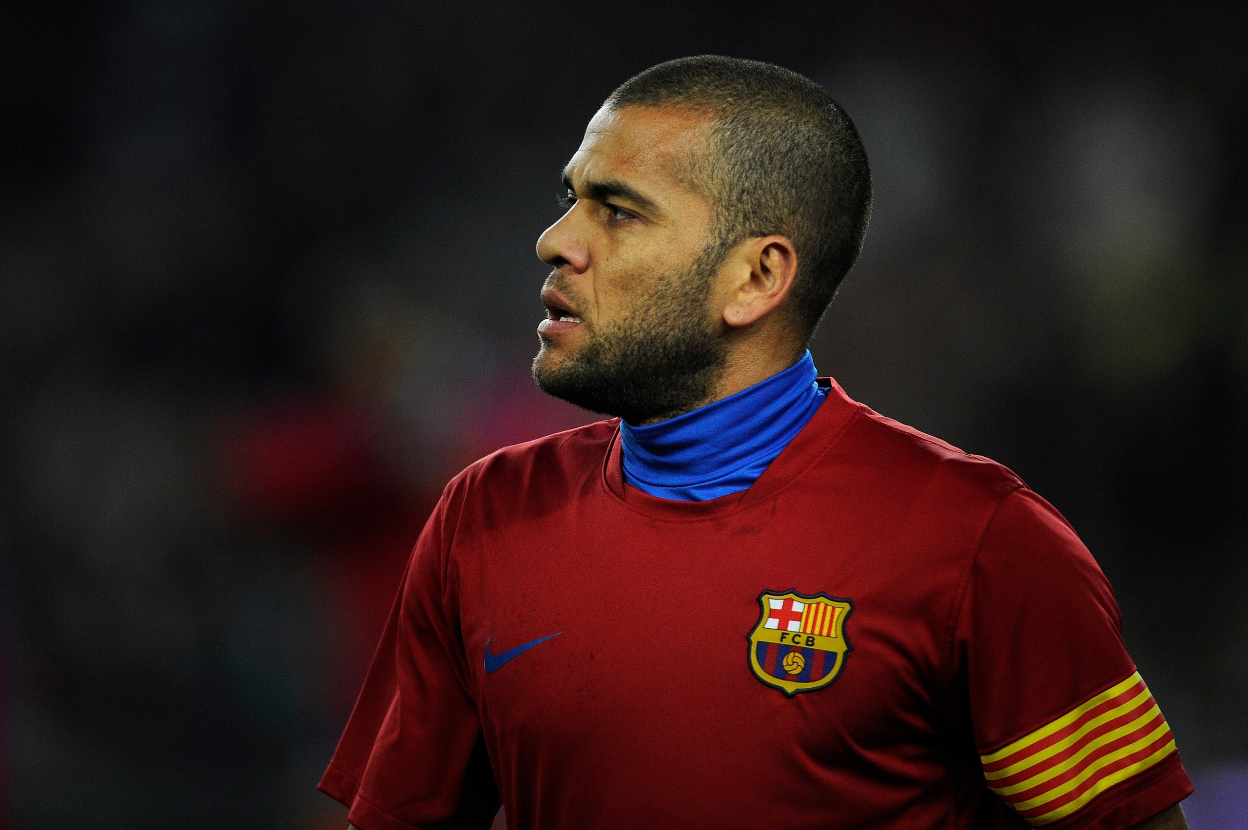 BARCELONA, SPAIN - JANUARY 02:  Dani Alves of Barcelona looks on during the warm up prior the La Liga match between Barcelona and Levante UD at Camp Nou on January 2, 2011 in Barcelona, Spain. Barcelona won 2-1.  (Photo by David Ramos/Getty Images)