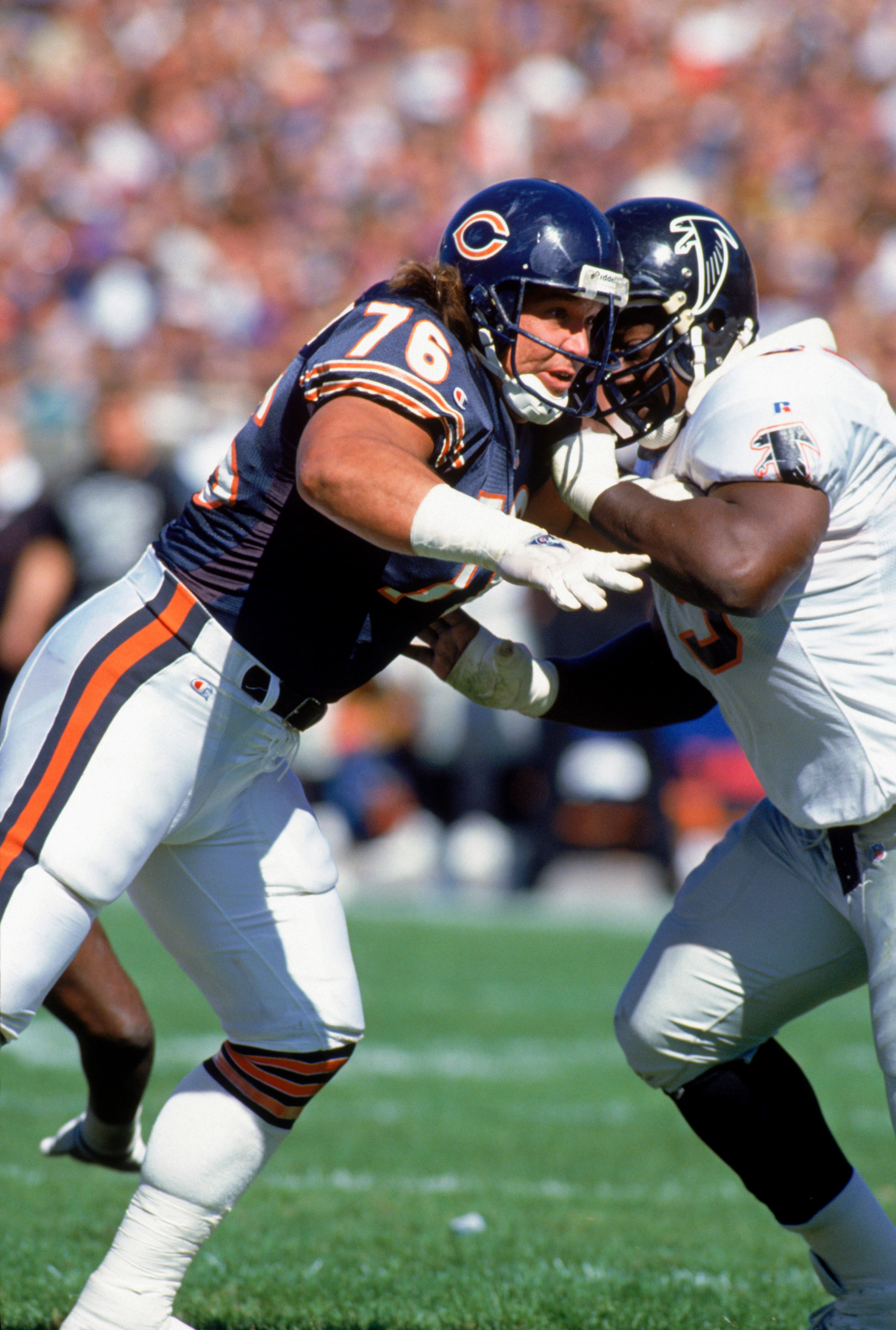 CHICAGO - OCTOBER 3:  Steve McMichael #76 of the Chicago Bears is under pressure during the game against the Atlanta Falcons on October 3,1993 in Chicago, Illinois. The Bears won 6-0. (Photo by Jonathan Daniel/Getty Images)