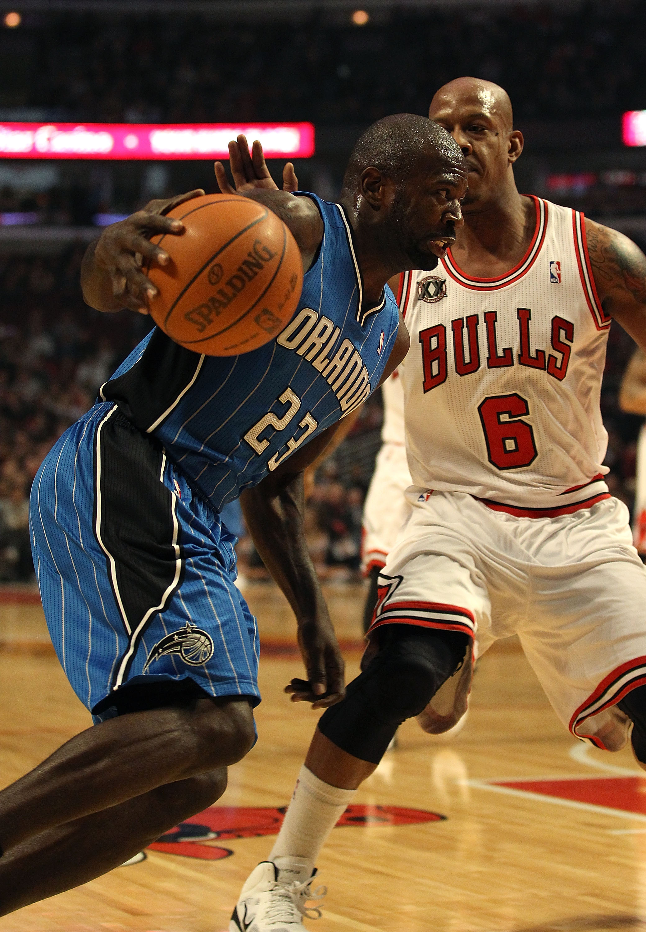 CHICAGO, IL - JANUARY 28: Jason Richardson #23 of the Orlando Magic moves against Keith Bogans #6 of the Chicago Bulls at the United Center on January 28, 2011 in Chicago, Illinois. The Bulls defeated the Magic 99-90. NOTE TO USER: User expressly acknowle