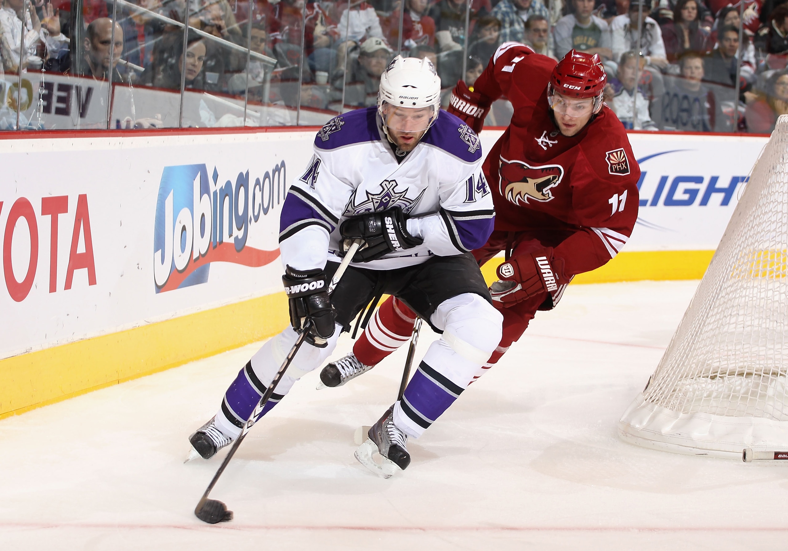 GLENDALE, AZ - JANUARY 22: Justin Williams #14 of the Los Angeles Kings skates with the puck during the NHL game against the Phoenix Coyotes at Jobing.com Arena on January 22, 2011 in Glendale, Arizona. The Kings defeated the Coyotes 4-3. (Photo by Chr GLENDALE, AZ - JANUARY 22: Justin Williams #14 of the Los Angeles Kings skates with the puck during the NHL game against the Phoenix Coyotes at Jobing.com Arena on January 22, 2011 in Glendale, Arizona. The Kings defeated the Coyotes 4-3. (Photo by Chr