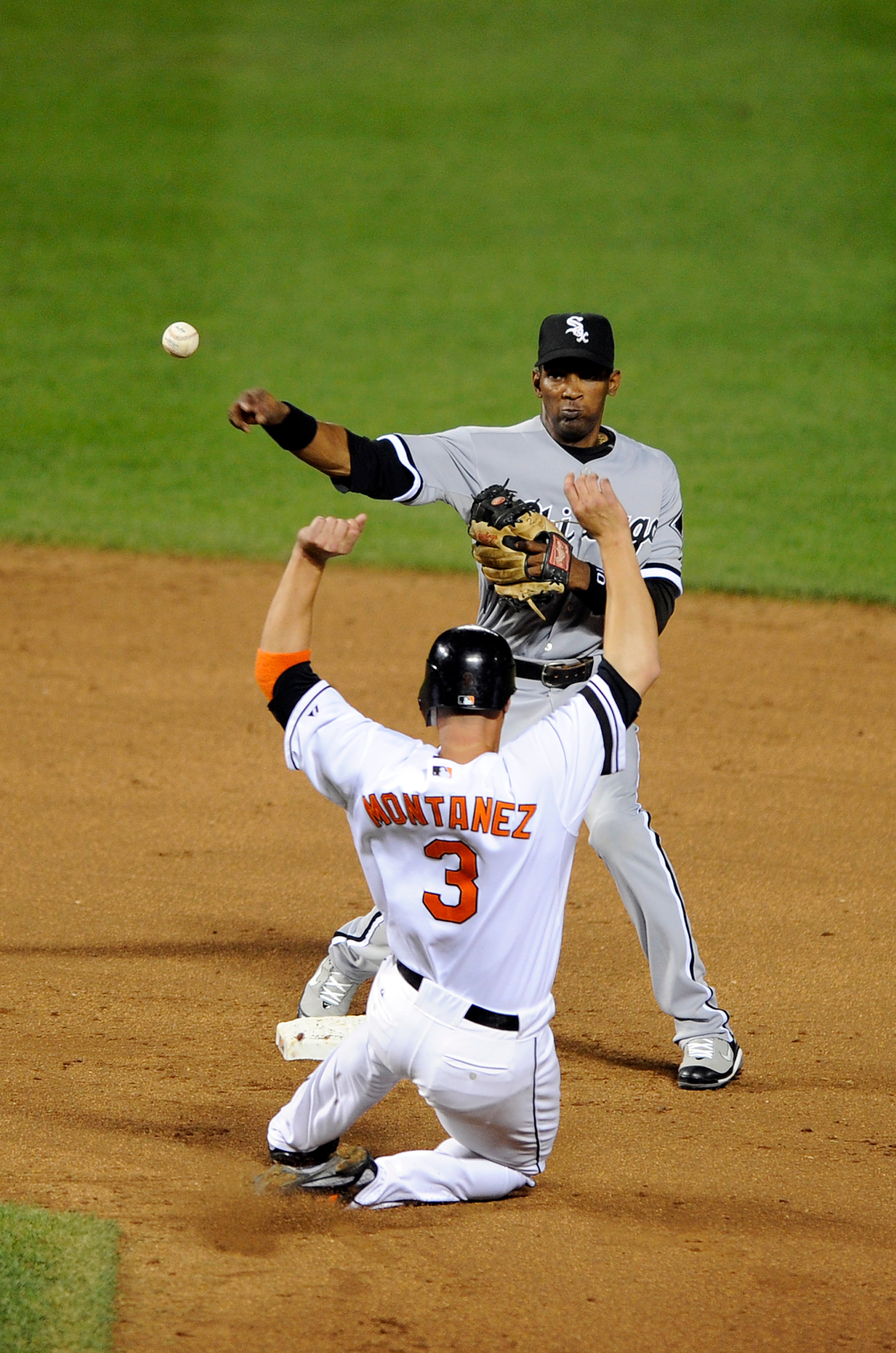 BALTIMORE - AUGUST 27:  Alexi Ramirez #10 of the Chicago White Sox forces out Lou Montanez #3 of the Baltimore Orioles to start a double play at Camden Yards August 27, 2008 in Baltimore, Maryland.  (Photo by Greg Fiume/Getty Images)