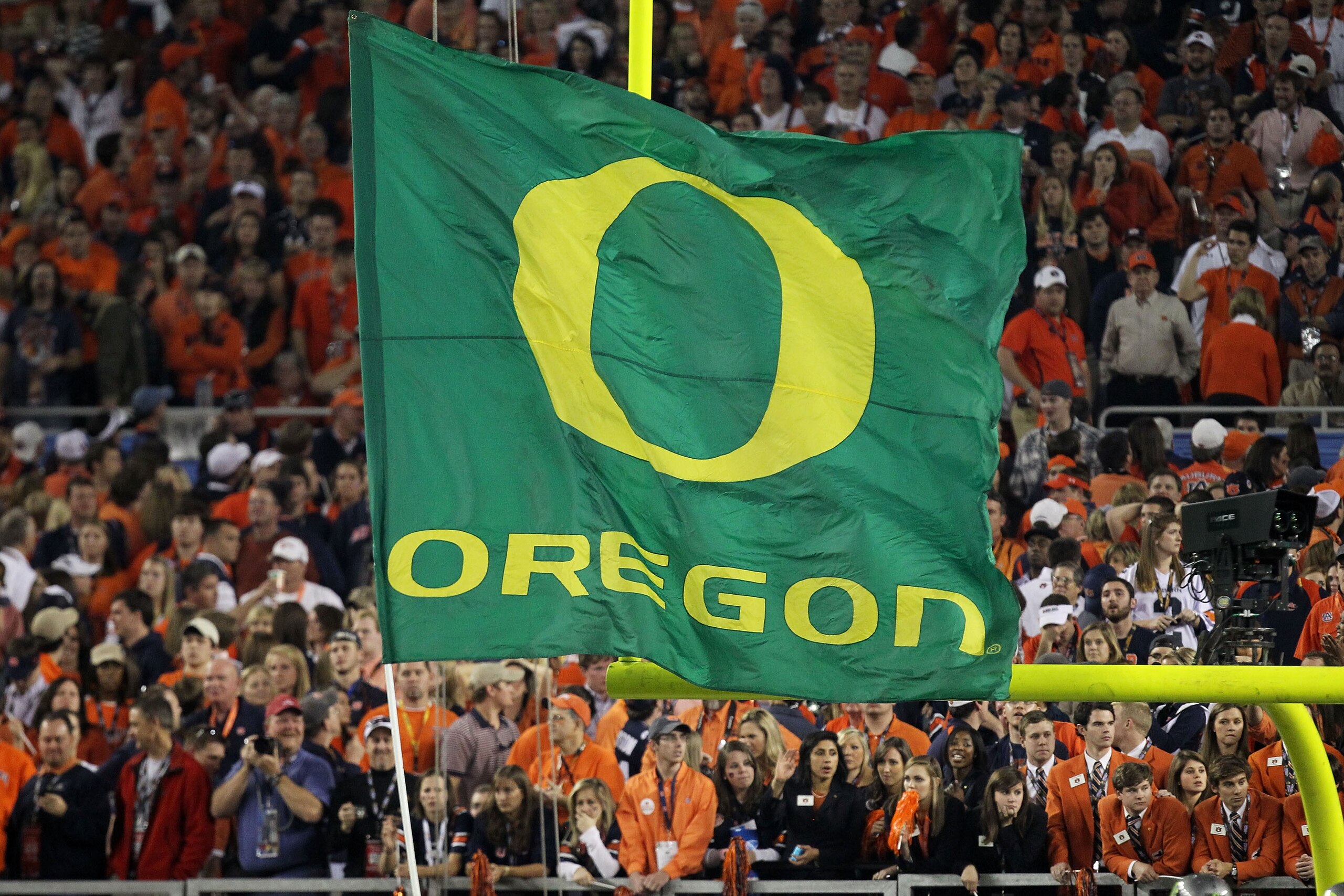GLENDALE, AZ - JANUARY 10:  An Oregon Ducks flag is displayed at the Tostitos BCS National Championship Game against the Auburn Tigers at University of Phoenix Stadium on January 10, 2011 in Glendale, Arizona.  (Photo by Jonathan Ferrey/Getty Images)