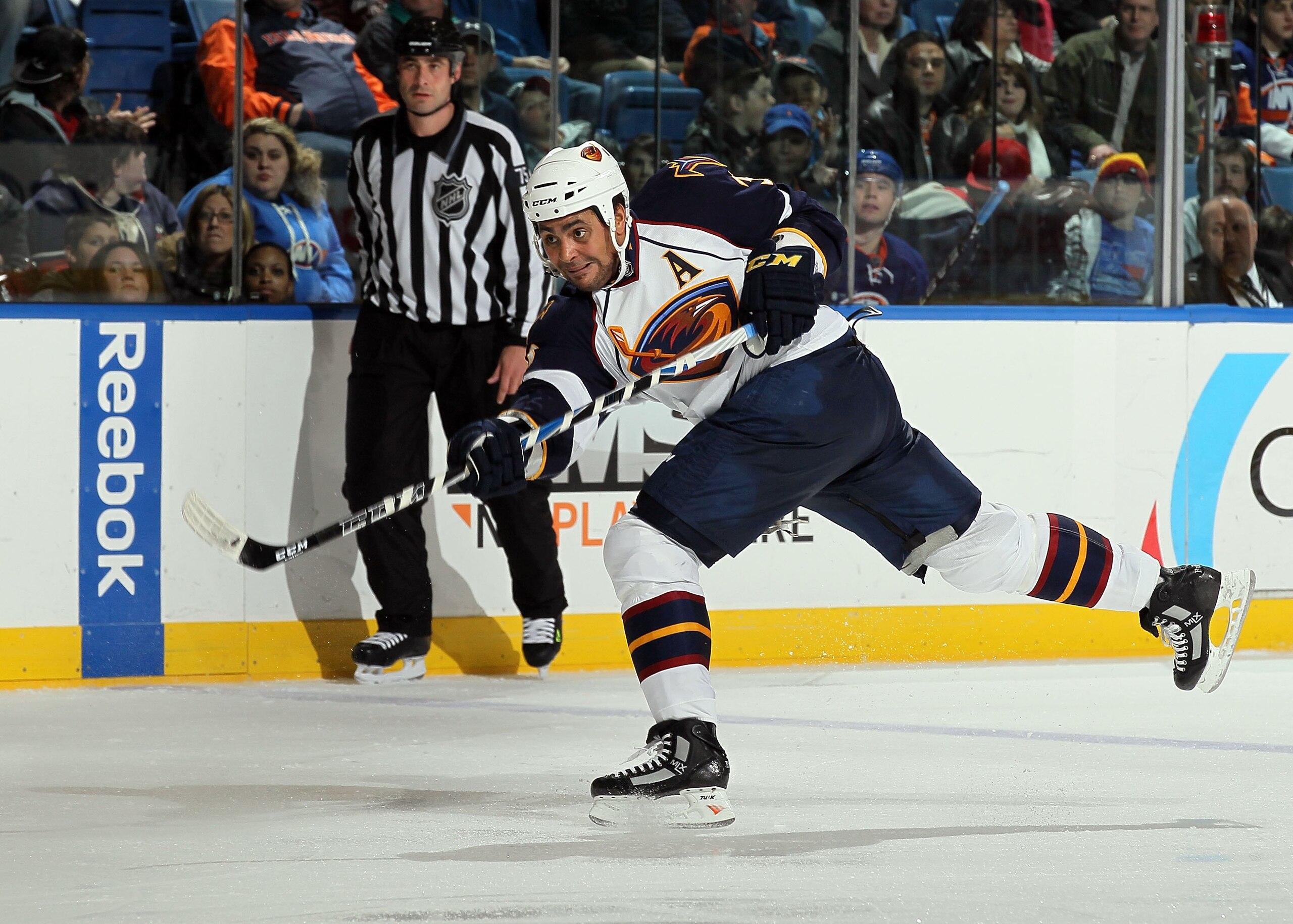 UNIONDALE, NY - DECEMBER 11: Dustin Byfuglien #33 of the Atlanta Thrashers skates against the New York Islanders on December 11, 2010 at Nassau Coliseum in Uniondale, New York. The Thrashers defeated the Isles 5-4. (Photo by Jim McIsaac/Getty Images) UNIONDALE, NY - DECEMBER 11: Dustin Byfuglien #33 of the Atlanta Thrashers skates against the New York Islanders on December 11, 2010 at Nassau Coliseum in Uniondale, New York. The Thrashers defeated the Isles 5-4. (Photo by Jim McIsaac/Getty Images)