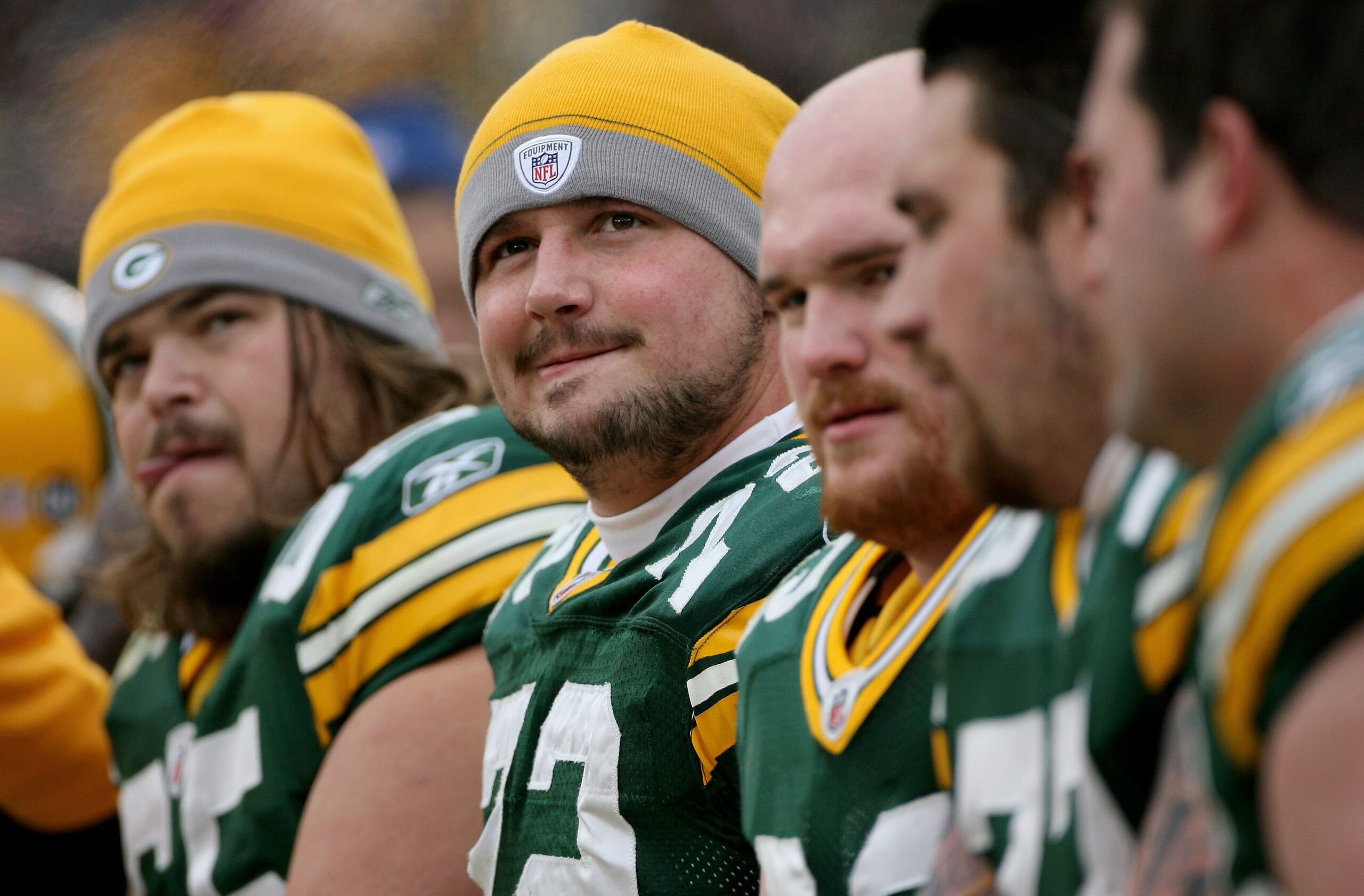GREEN BAY, WI - NOVEMBER 16:  Guard Jason Spitz #72 and the Green Bay Packers offensive line await action on the bench against the Chicago Bears during NFL action at Lambeau Field on November 16, 2008 in Green Bay, Wisconsin. The Packers defeated the Bear
