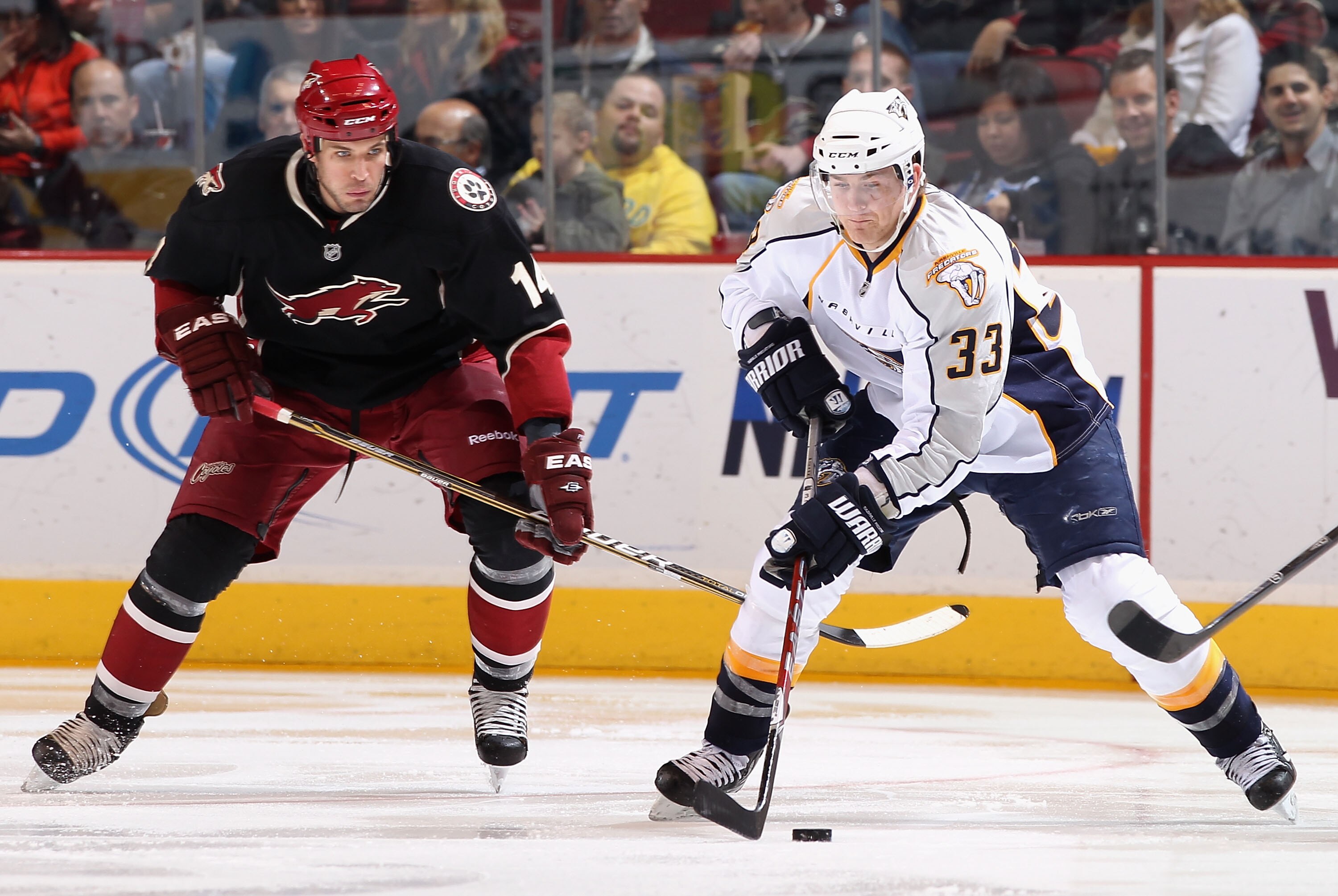 GLENDALE, AZ - JANUARY 18:  Colin Wilson #33 of the Nashville Predators skates with the puck during the NHL game against the Phoenix Coyotes at Jobing.com Arena on January 18, 2011 in Glendale, Arizona.  The Predators defeated the Coyotes 5-2.  (Photo by