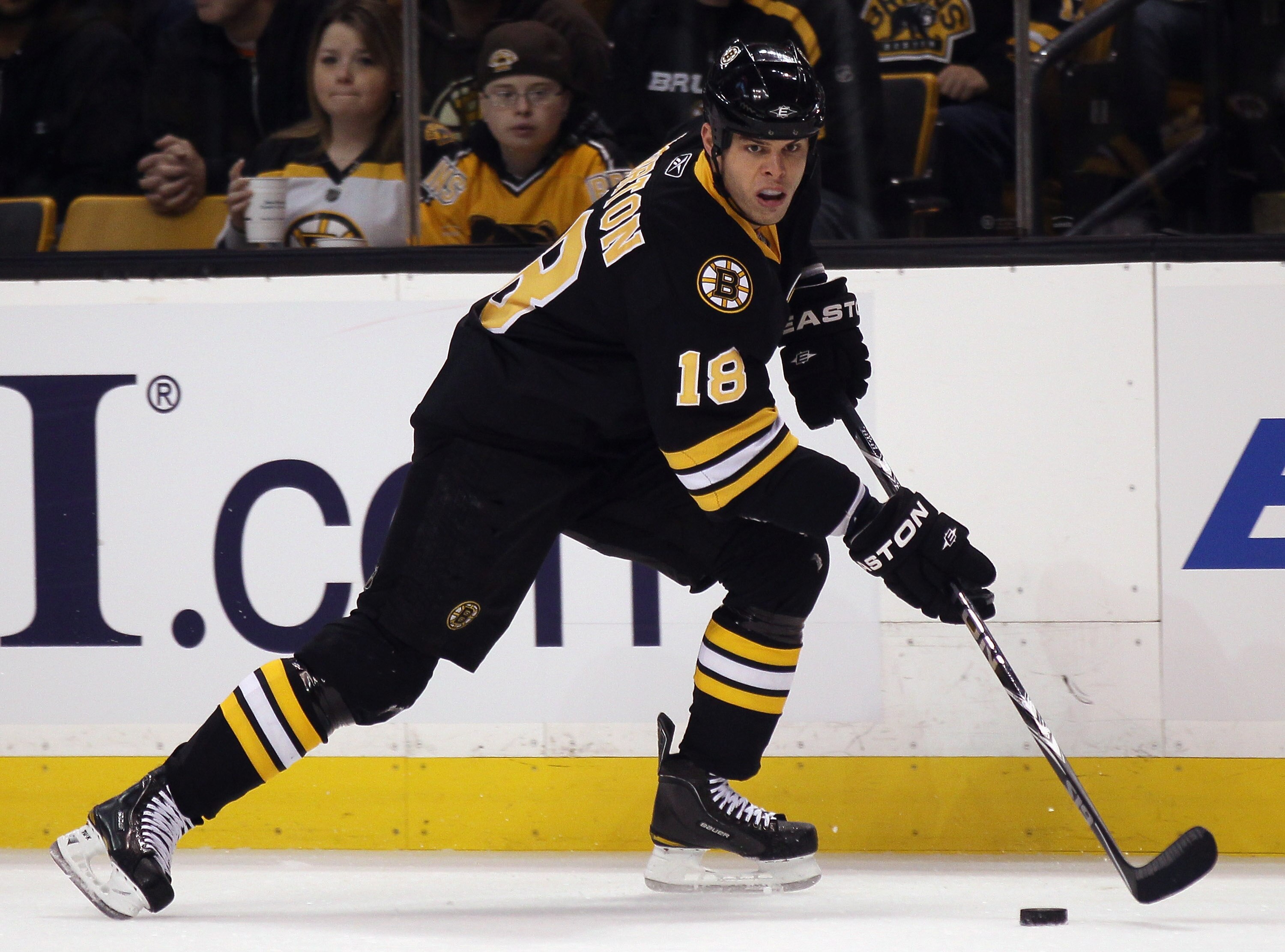 BOSTON, MA - NOVEMBER 26:  Nathan Horton #18 of the Boston Bruins takes the puck against the Carolina Hurricanes on November 26, 2010 at the TD Garden in Boston, Massachusetts.  (Photo by Elsa/Getty Images)