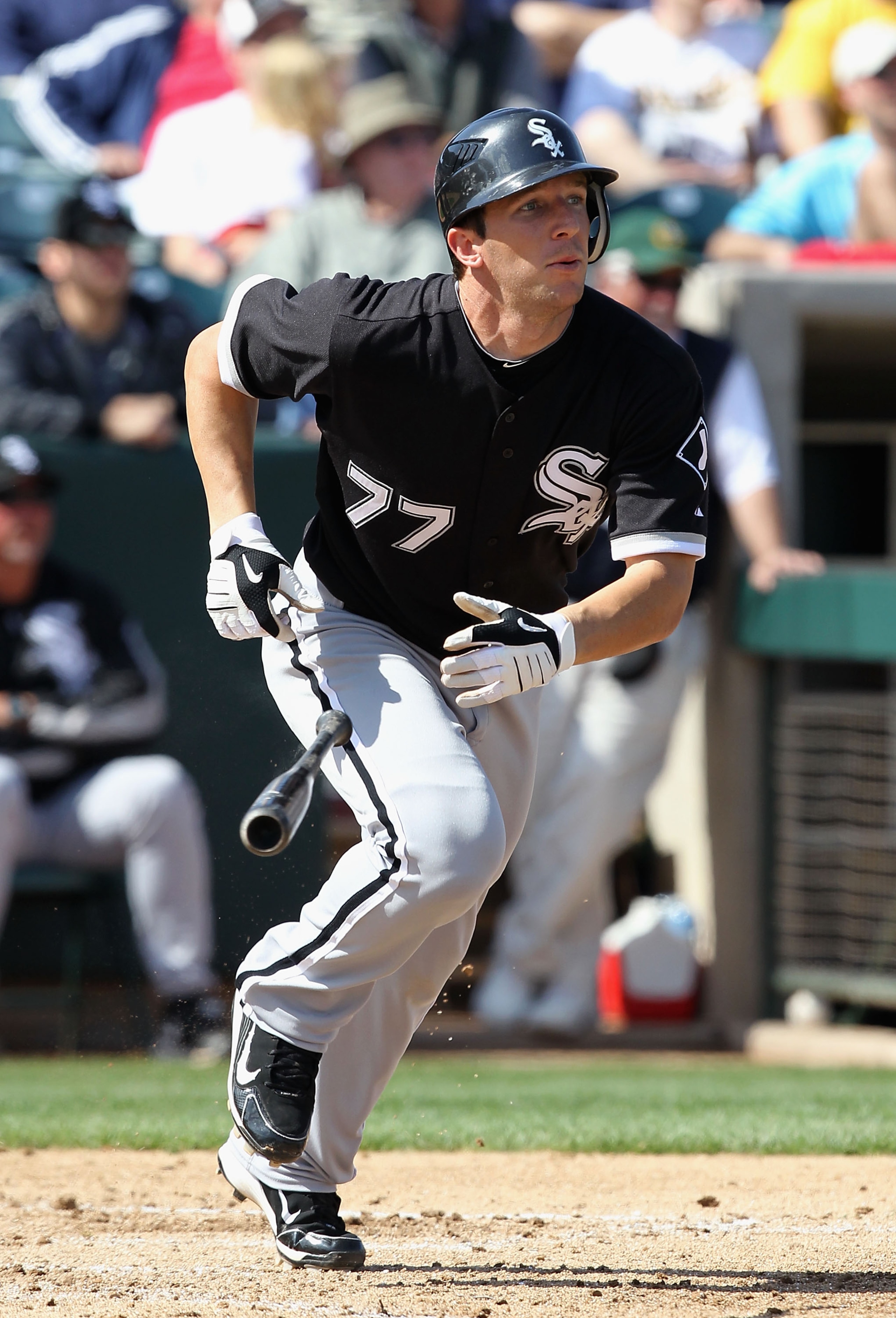 PHOENIX - MARCH 10:  Brent Morel #77 of the Chicago White Sox hits a double against the Oakland Athletics during the third inning of the MLB spring training game at Phoenix Municipal Stadium on March 10, 2010 in Phoenix, Arizona. The White Sox defeated th
