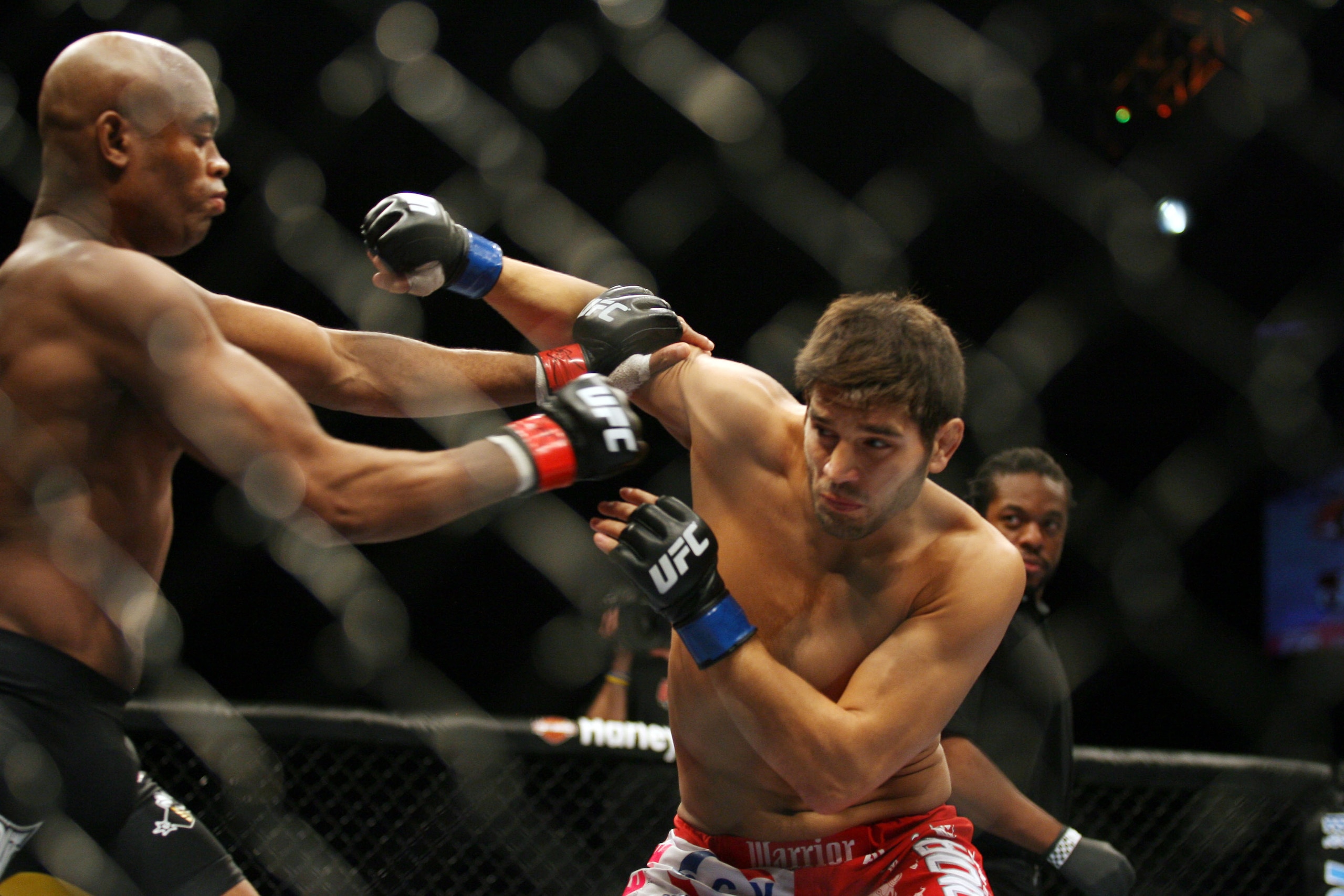 CHICAGO- OCTOBER 25: Anderson Silva (L) punches Patrick Cote in the Middleweight Title Bout at UFC's Ultimate Fight Night at Allstate Arena on October 25, 2008 in Chicago, Illinois. (Photo by Tasos Katopodis/Getty Images) CHICAGO- OCTOBER 25: Anderson Silva (L) punches Patrick Cote in the Middleweight Title Bout at UFC's Ultimate Fight Night at Allstate Arena on October 25, 2008 in Chicago, Illinois. (Photo by Tasos Katopodis/Getty Images)