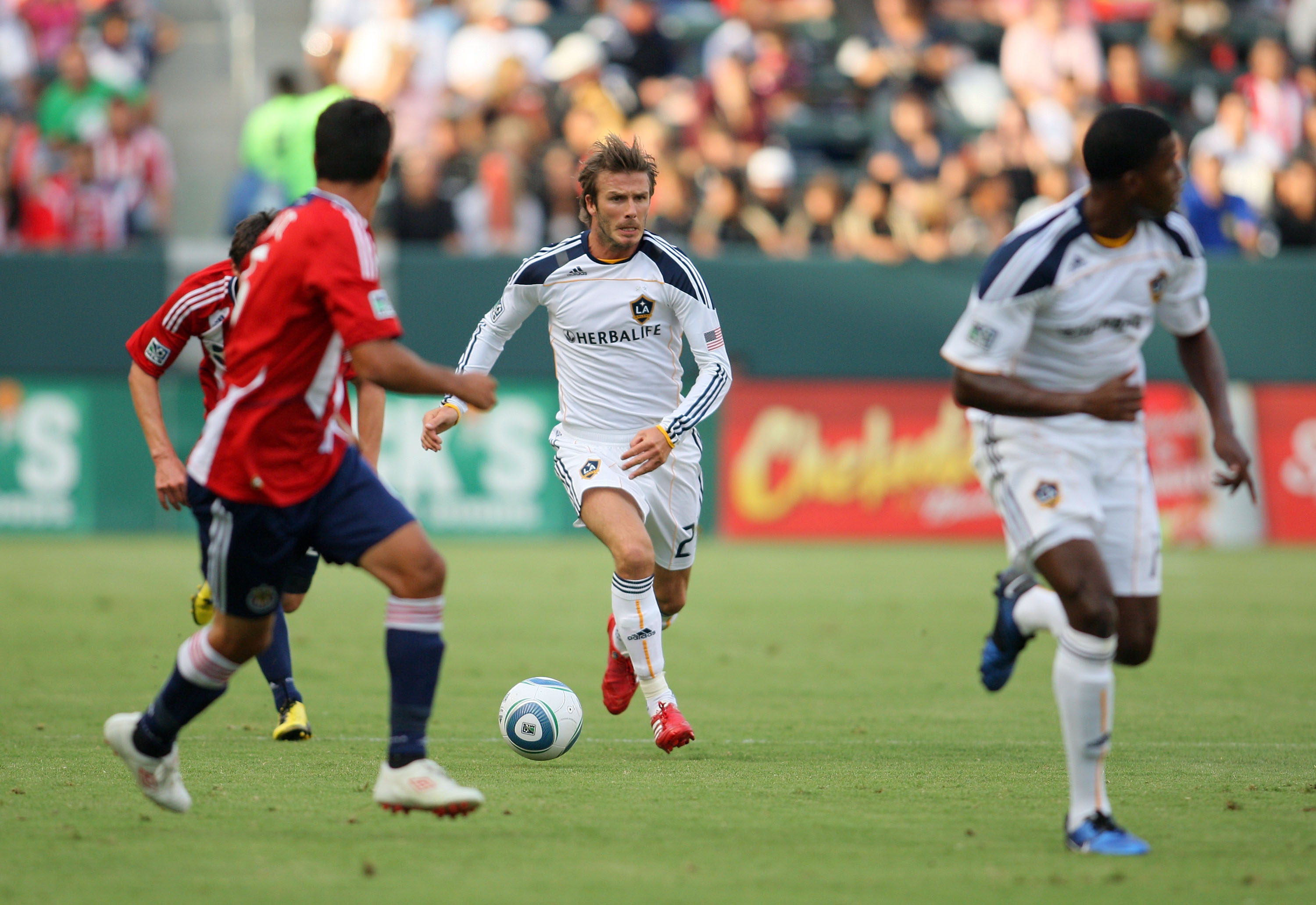 CARSON, CA - OCTOBER 03:  David Beckham #23 of the Los Angeles Galaxy plays the ball through midfield on the counterattack against Chivas USA during the MLS match at The Home Depot Center on October 3, 2010 in Carson, California. The Galaxy defeated Chiva