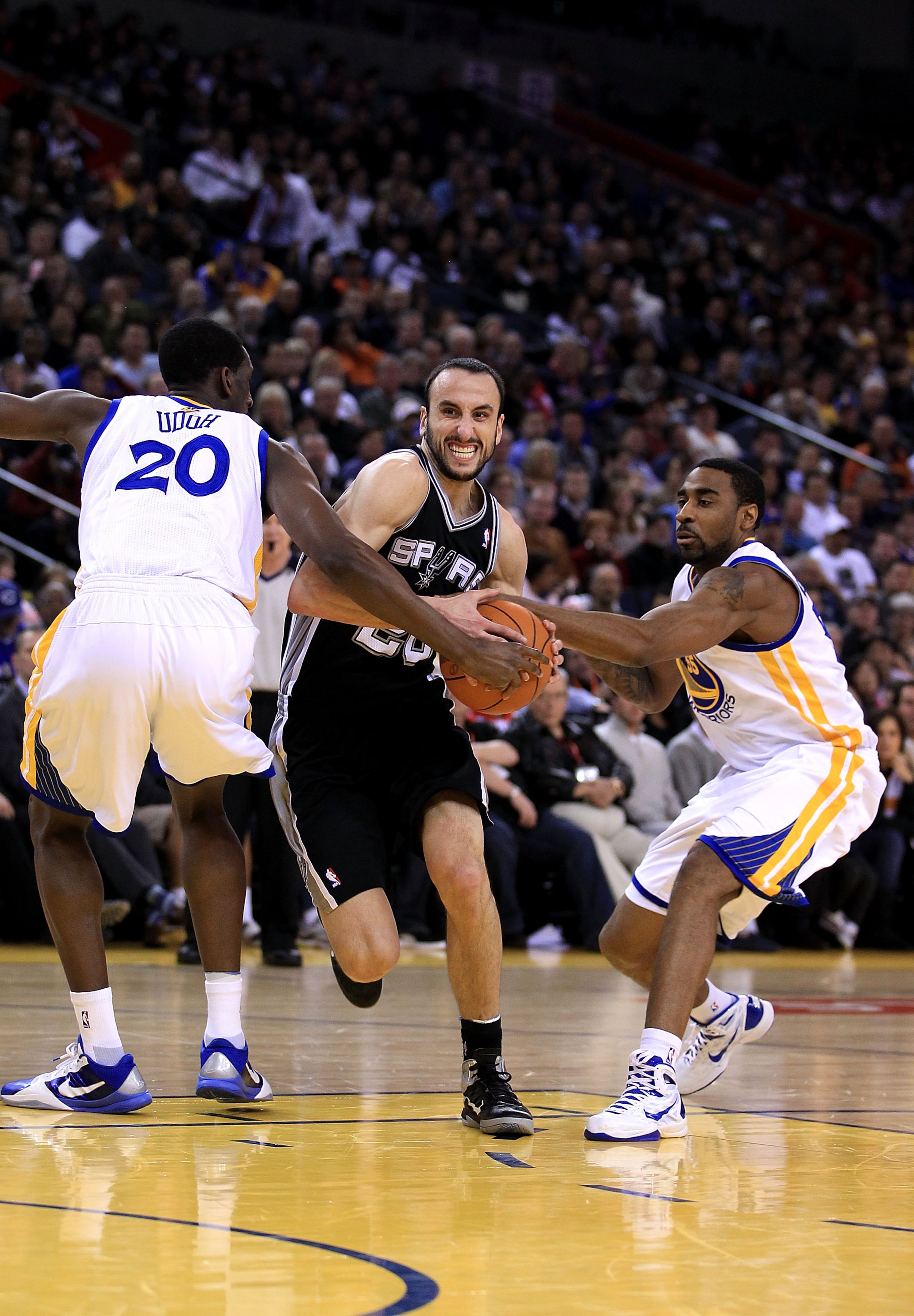OAKLAND, CA - JANUARY 24: Manu Ginobili #20 of the San Antonio Spurs in action against the Golden State Warriors at Oracle Arena on January 24, 2011 in Oakland, California. NOTE TO USER: User expressly acknowledges and agrees that, by downloading and or OAKLAND, CA - JANUARY 24: Manu Ginobili #20 of the San Antonio Spurs in action against the Golden State Warriors at Oracle Arena on January 24, 2011 in Oakland, California. NOTE TO USER: User expressly acknowledges and agrees that, by downloading and or