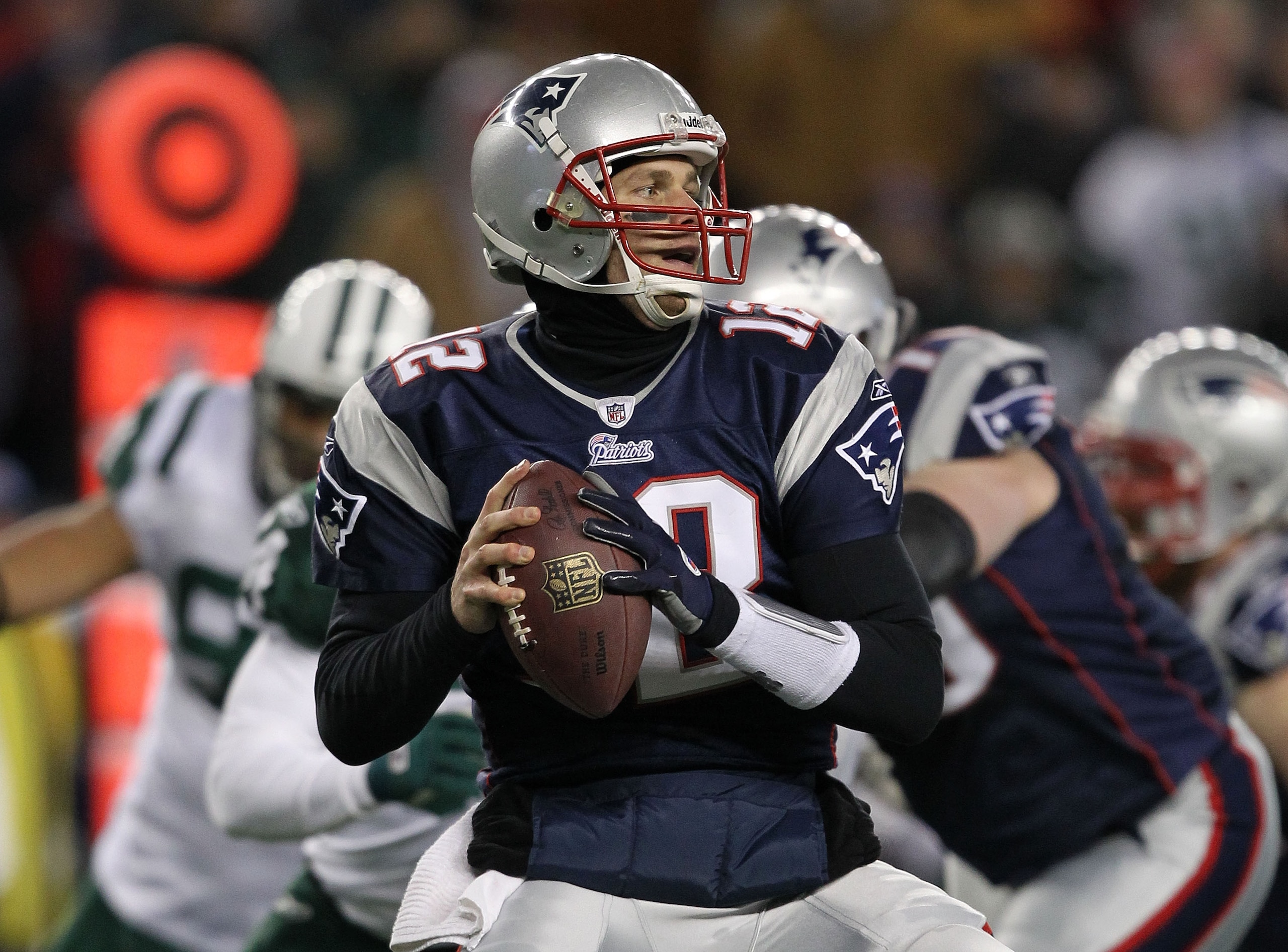 FOXBORO, MA - JANUARY 16:  Quarterback Tom Brady #12 of the New England Patriots looks to pass during their 2011 AFC divisional playoff game against the New York Jets at Gillette Stadium on January 16, 2011 in Foxboro, Massachusetts.  (Photo by Al Bello/G
