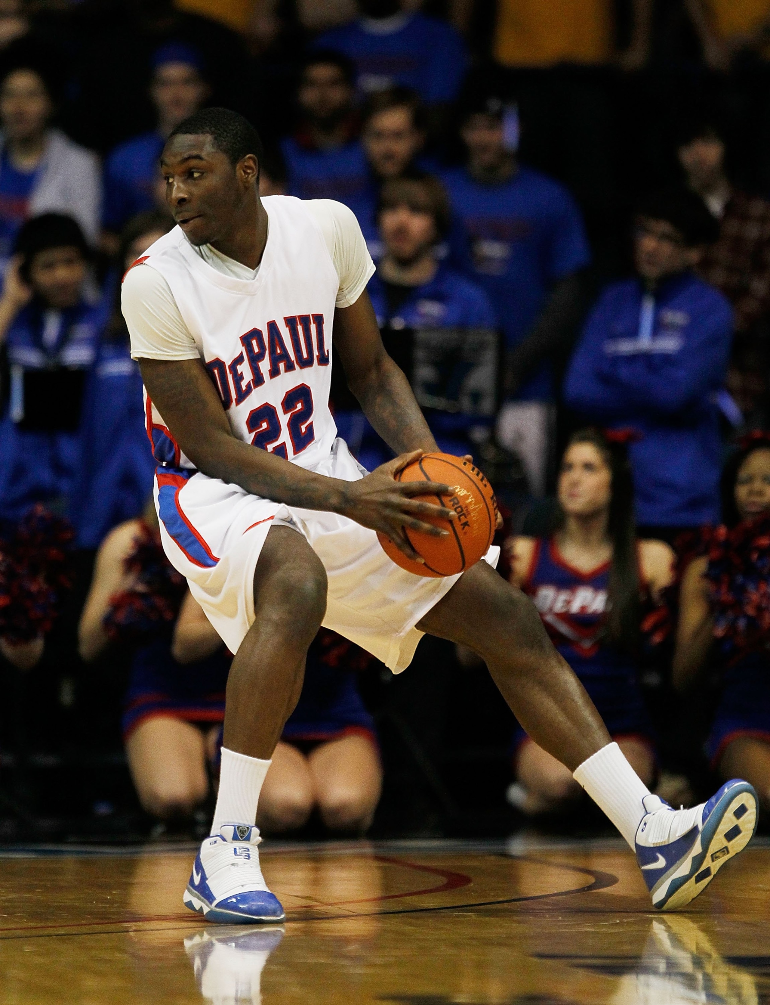 ROSEMONT, IL - JANUARY 20: Tony Freeland #22 of the DePaul Blue Demons looks to passd against the Marquette Golden Eagles at the Allstate Arena on January 20, 2010 in Rosemont, Illinois. DePaul defeated Marquette 51-50. (Photo by Jonathan Daniel/Getty Ima