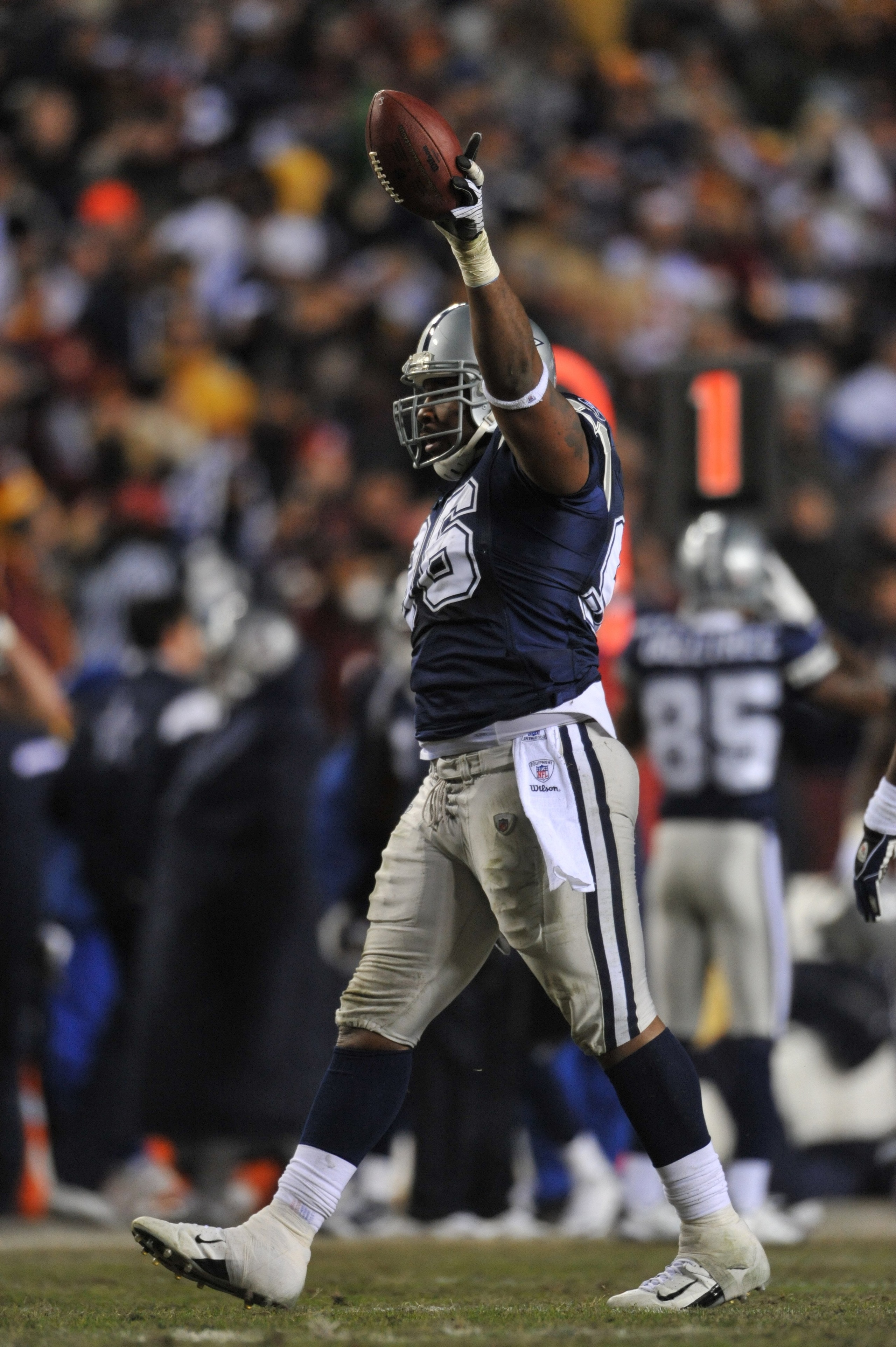 LANDOVER, MD - DECEMBER 27:  Marcus Spears #96 of the Dallas Cowboys celebrates the recovery of the ball during the game against the Washington Redskins at FedExField on December 27, 2009 in Landover, Maryland. The Cowboys defeated the Redskins 17-0. (Pho