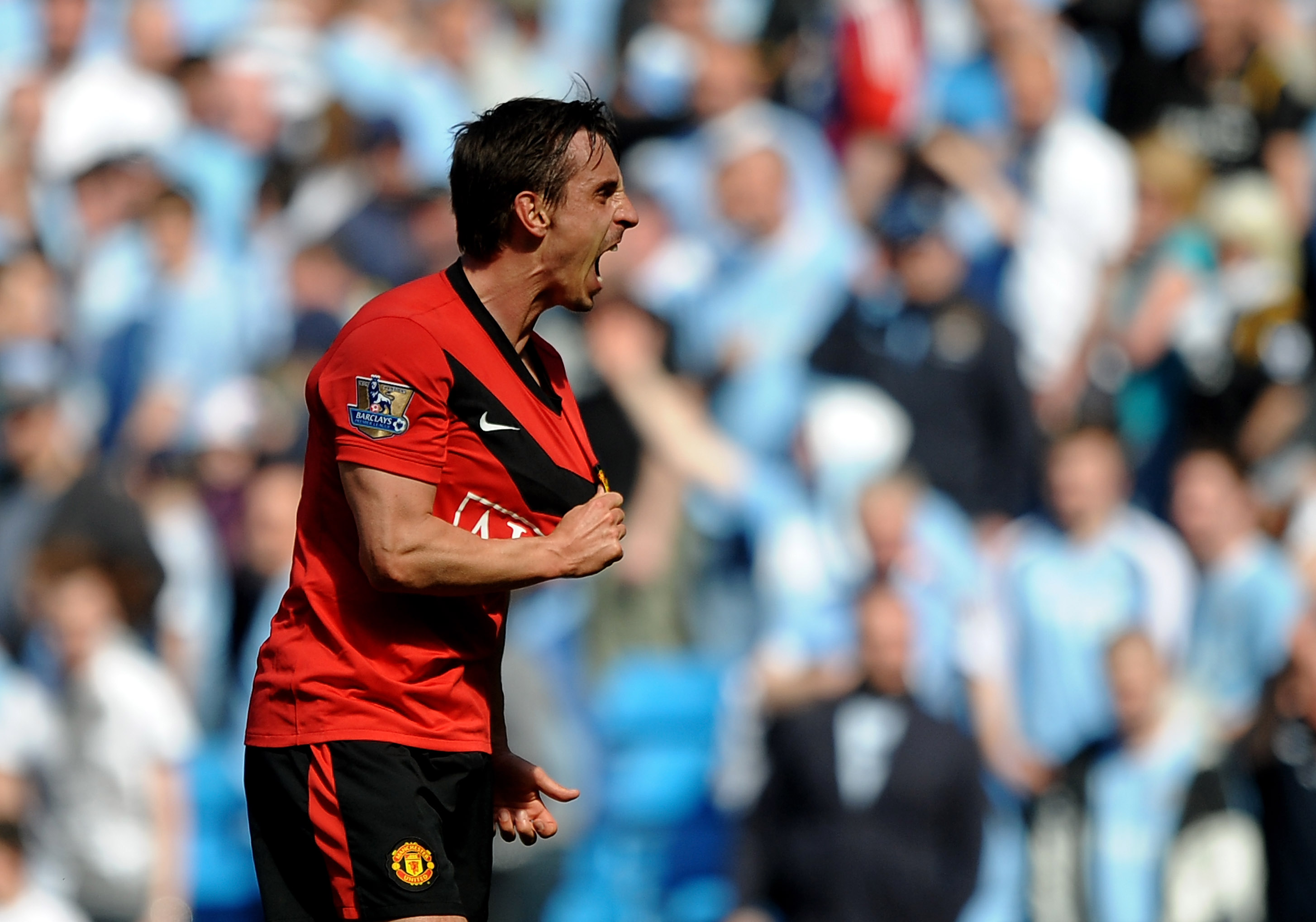 MANCHESTER, ENGLAND - APRIL 17:  Gary Neville of Manchester United celebrates at the end of  the Barclays Premier League match between Manchester City and Manchester United at the City of Manchester Stadium on April 17, 2010 in Manchester, England.  (Phot