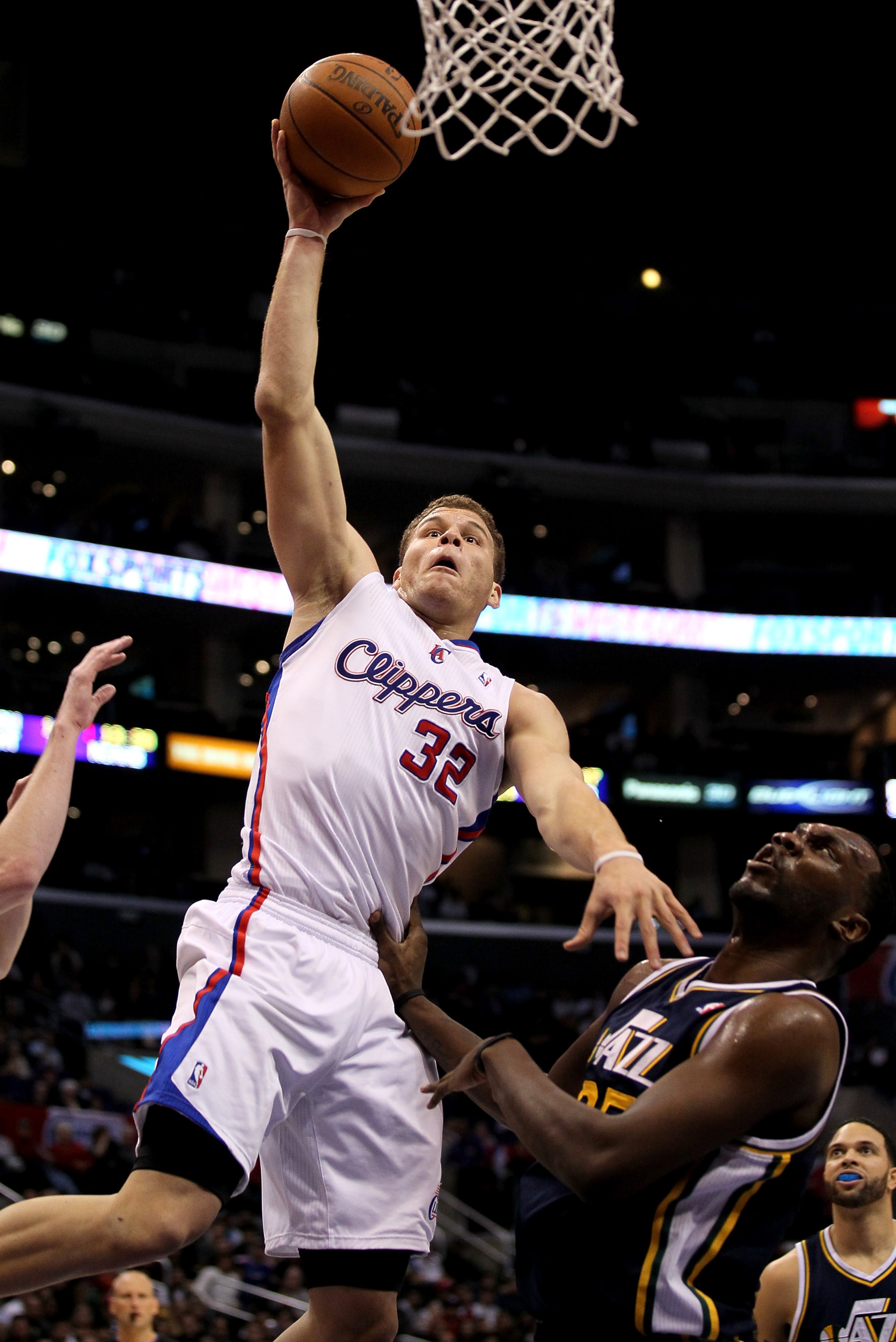 LOS ANGELES, CA - DECEMBER 29: Blake Griffin #32 of the Los Angeles Clippers goes up for a dunk over Al Jefferson #25 of the Utah Jazz at Staples Center on December 29, 2010 in Los Angeles, California. NOTE TO USER: User expressly acknowledges and agr LOS ANGELES, CA - DECEMBER 29: Blake Griffin #32 of the Los Angeles Clippers goes up for a dunk over Al Jefferson #25 of the Utah Jazz at Staples Center on December 29, 2010 in Los Angeles, California. NOTE TO USER: User expressly acknowledges and agr