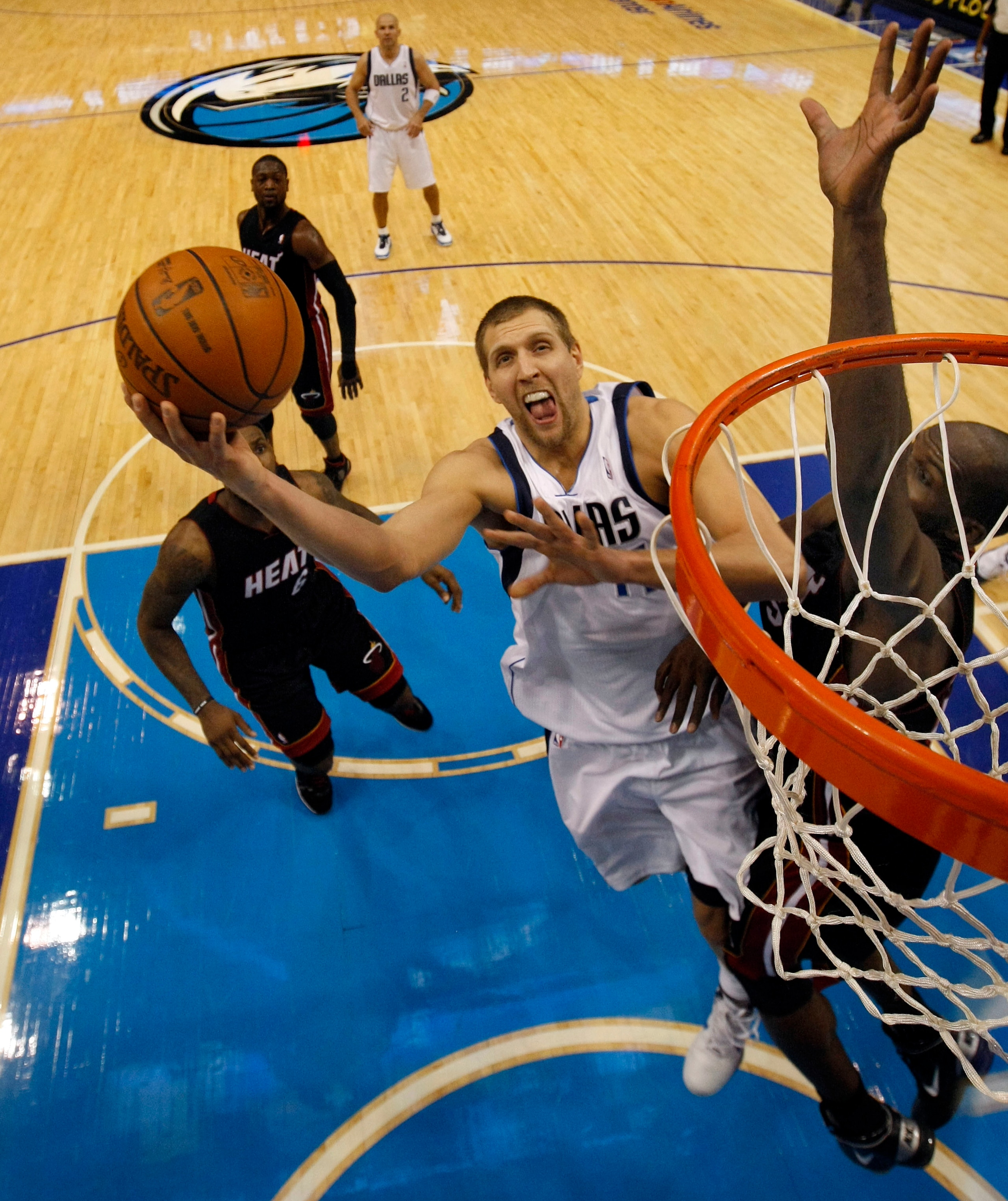 DALLAS - NOVEMBER 27: Dirk Nowitzki #41 of the Dallas Mavericks shoots against the Miami Heat on November 27, 2010 at the American Airlines Center in Dallas, Texas. NOTE TO USER: User expressly acknowledges and agrees that, by downloading and or using th DALLAS - NOVEMBER 27: Dirk Nowitzki #41 of the Dallas Mavericks shoots against the Miami Heat on November 27, 2010 at the American Airlines Center in Dallas, Texas. NOTE TO USER: User expressly acknowledges and agrees that, by downloading and or using th