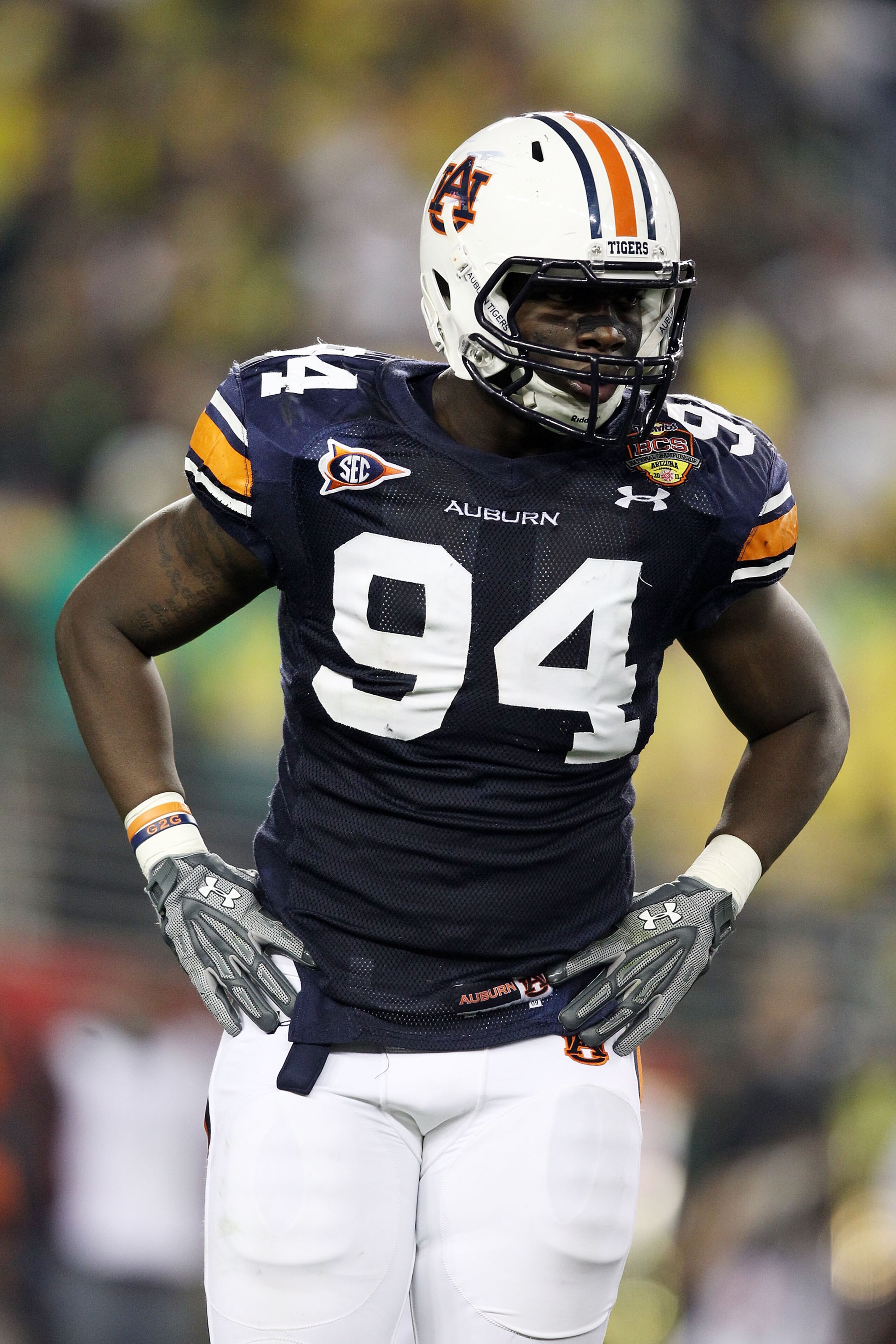 GLENDALE, AZ - JANUARY 10: Nosa Eguae #94 of the Auburn Tigers looks on against the Oregon Ducks during the Tostitos BCS National Championship Game at University of Phoenix Stadium on January 10, 2011 in Glendale, Arizona. (Photo by Christian Petersen/G GLENDALE, AZ - JANUARY 10: Nosa Eguae #94 of the Auburn Tigers looks on against the Oregon Ducks during the Tostitos BCS National Championship Game at University of Phoenix Stadium on January 10, 2011 in Glendale, Arizona. (Photo by Christian Petersen/G
