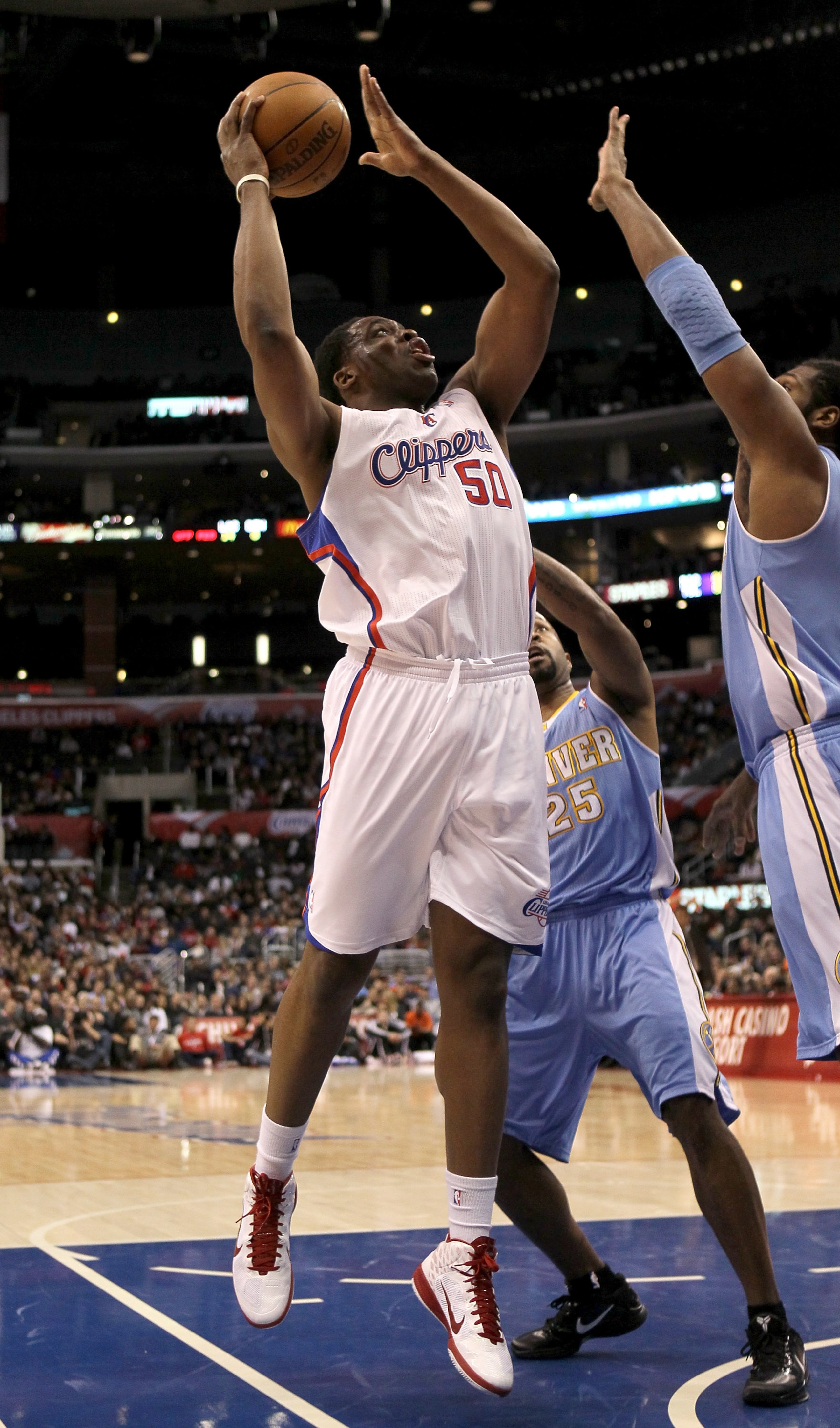 LOS ANGELES, CA - JANUARY 5: Ike Diogu #50 of the Los Angeles Clippers shoots against the Denver Nuggets at Staples Center on January 5, 2011 in Los Angeles, California. The Clippers won 106-93. NOTE TO USER: User expressly acknowledges and agrees that LOS ANGELES, CA - JANUARY 5: Ike Diogu #50 of the Los Angeles Clippers shoots against the Denver Nuggets at Staples Center on January 5, 2011 in Los Angeles, California. The Clippers won 106-93. NOTE TO USER: User expressly acknowledges and agrees that