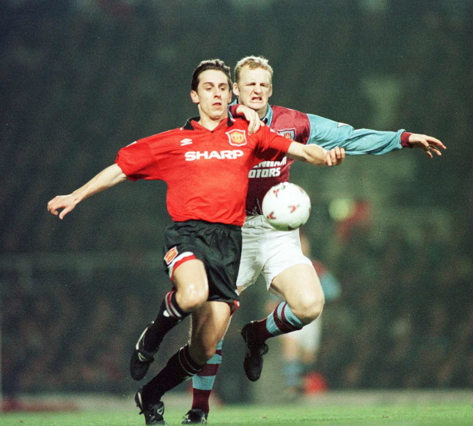 22 Jan 1996:   Defender Gary Neville of Manchester United holds off striker Ian Dowie of West Ham during a match against  Manchester United in a FA Premiership match at Upton Park, London. Mandatory Credit: Shaun Botterill/Allsport