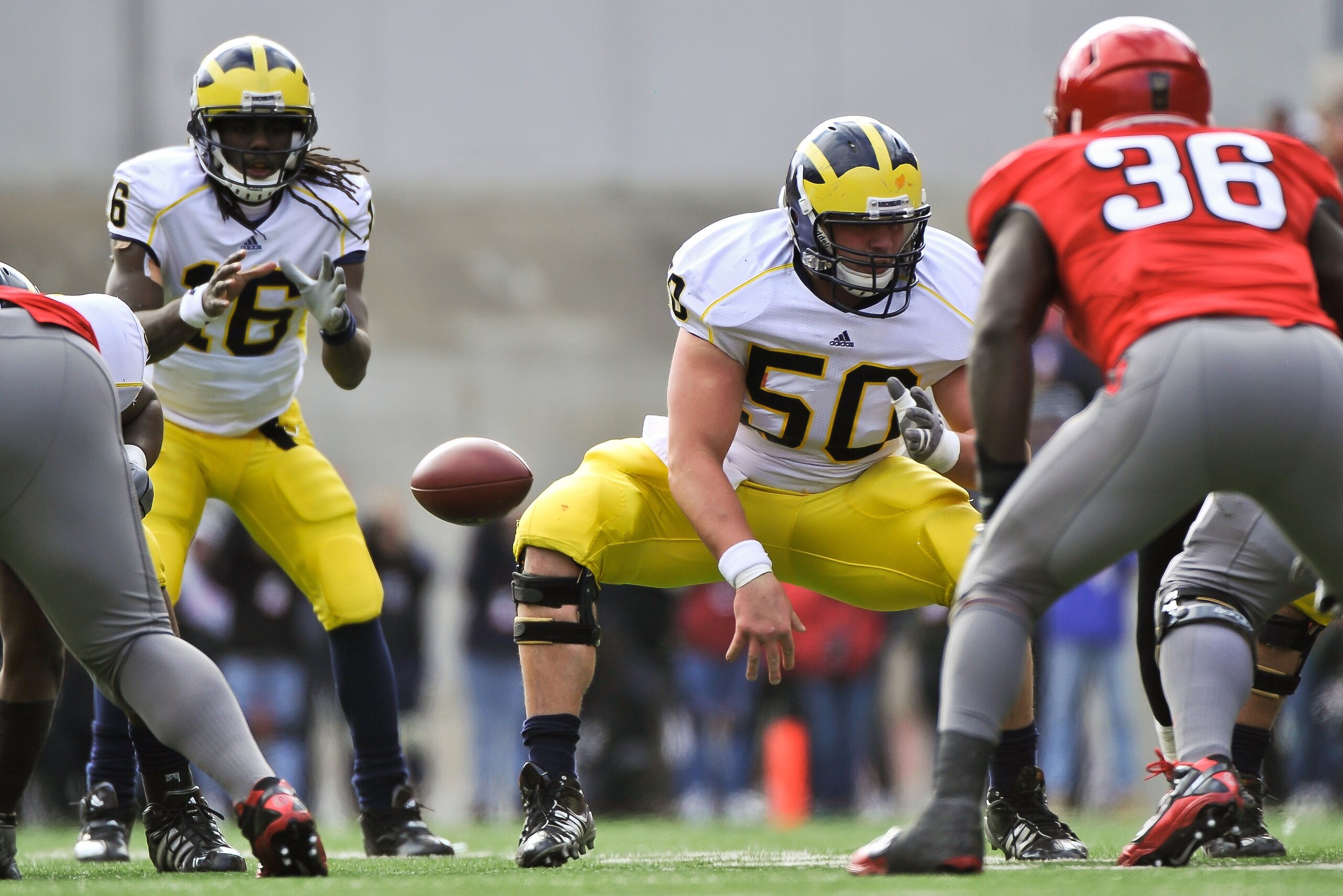 COLUMBUS, OH - NOVEMBER 27: David Molk #50 of the Michigan Wolverines blocks against the Ohio State Buckeyes at Ohio Stadium on November 27, 2010 in Columbus, Ohio. (Photo by Jamie Sabau/Getty Images) COLUMBUS, OH - NOVEMBER 27: David Molk #50 of the Michigan Wolverines blocks against the Ohio State Buckeyes at Ohio Stadium on November 27, 2010 in Columbus, Ohio. (Photo by Jamie Sabau/Getty Images)