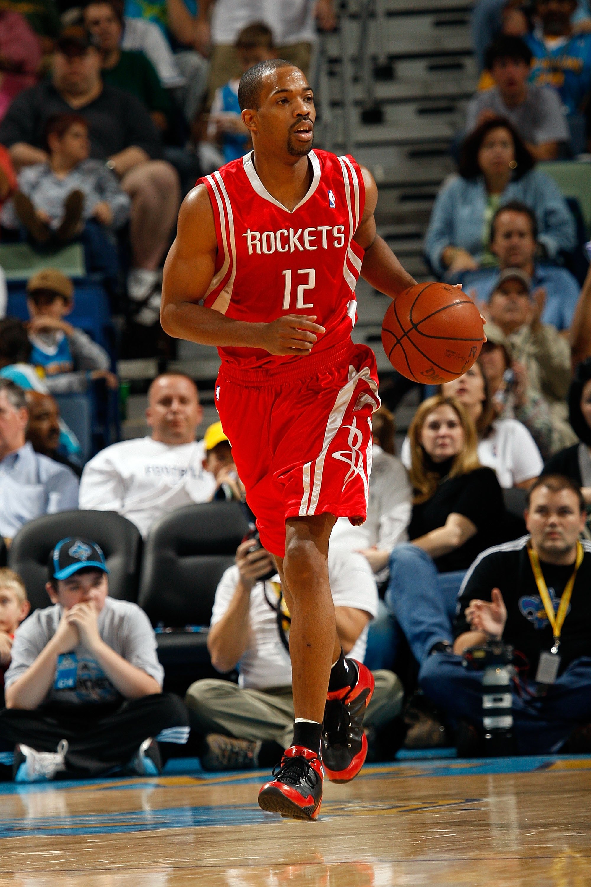 NEW ORLEANS - DECEMBER 26:  Rafer Alston #12 of the Houston Rockets dribbles the ball during the game against the New Orleans Hornets on December 26, 2008 at the New Orleans Arena in New Orleans, Louisiana.  NOTE TO USER: User expressly acknowledges and a