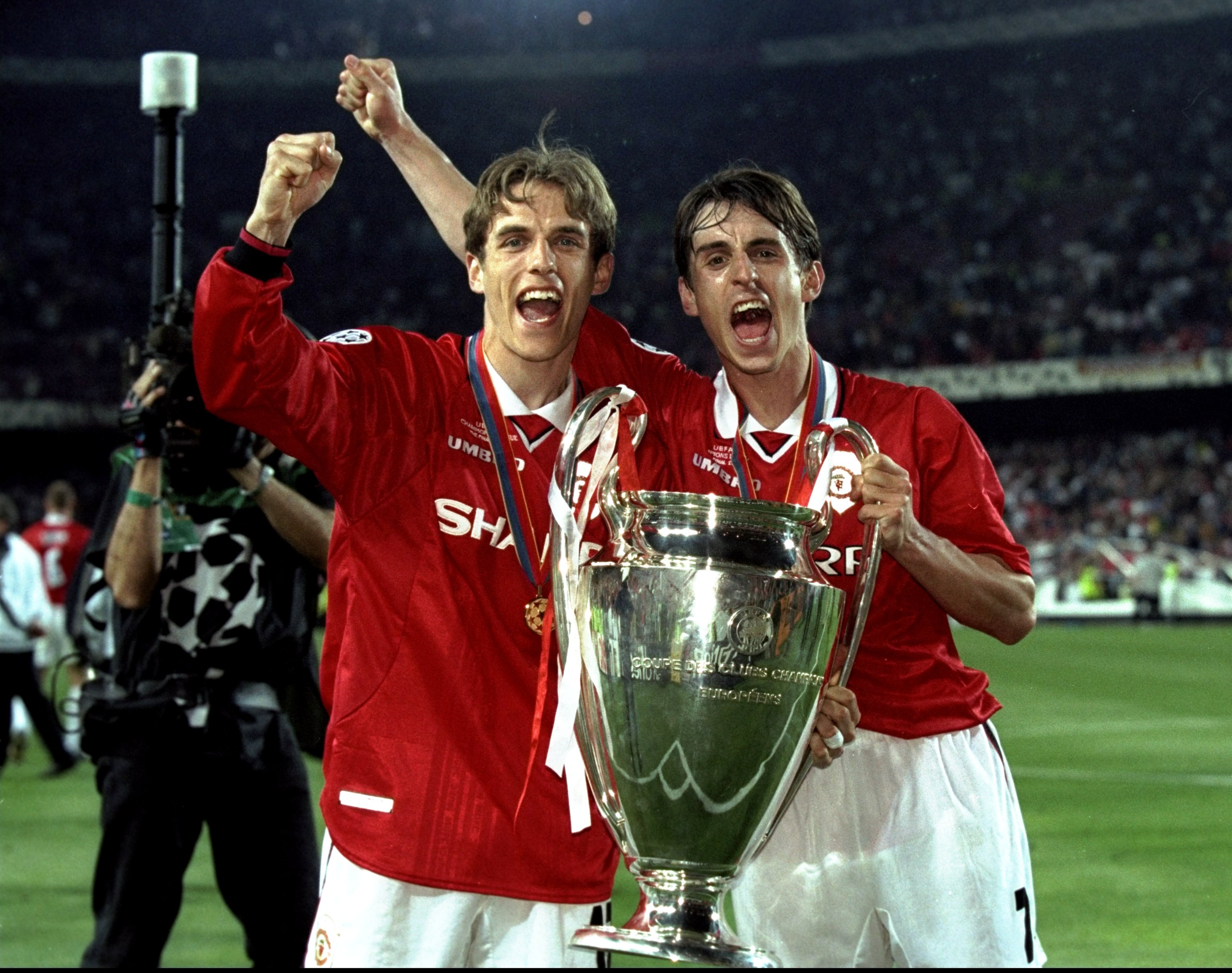 26 May 1999:  Brothers Phillip and Gary Neville of Manchester United with the European Cup after United beat Bayern Munich in the European Champions League Final in the Nou Camp Stadium, Barcelona, Spain. Manchester United won 2 - 1 with both United goals