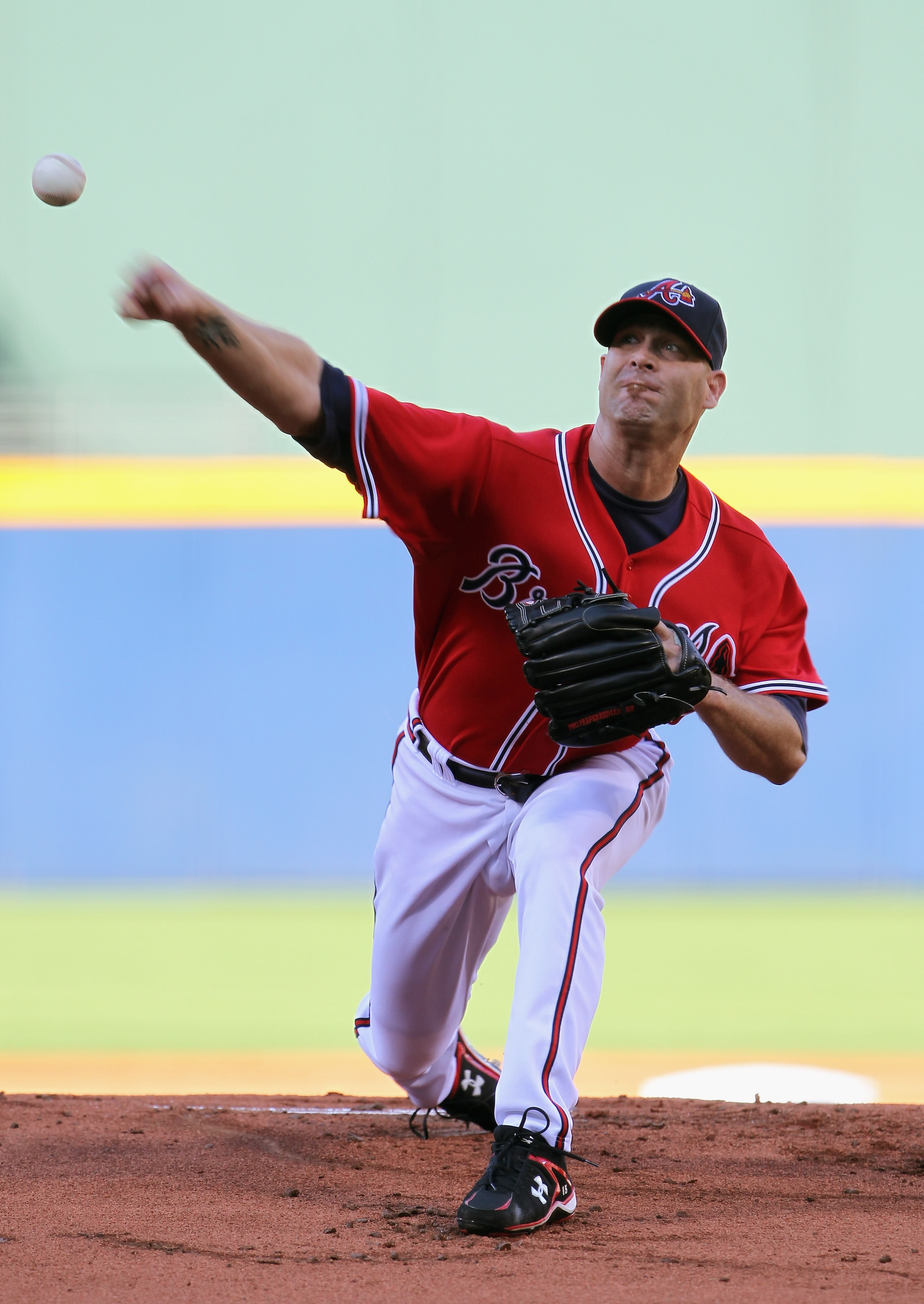 ATLANTA - OCTOBER 10:  Starting pitcher Tim Hudson #15 of the Atlanta Braves pitches during Game Three of the NLDS of the 2010 MLB Playoffs against the San Francisco Giants on October 10, 2010 at Turner Field in Atlanta, Georgia.  (Photo by Jamie Squire/G