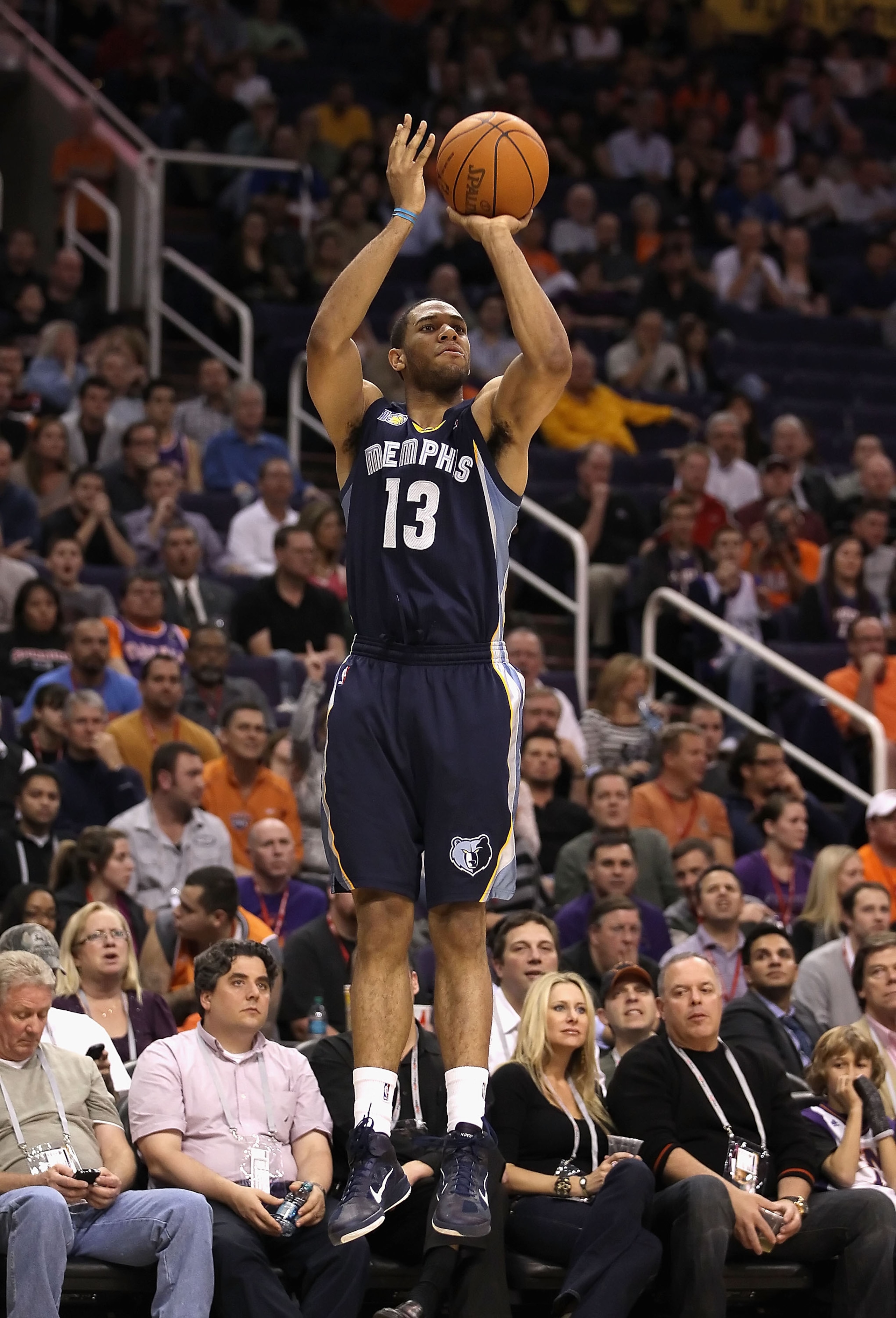 PHOENIX - DECEMBER 08: Xavier Henry #13 of the Memphis Grizzlies puts up a three point shot against the Phoenix Suns during the NBA game at US Airways Center on December 8, 2010 in Phoenix, Arizona. The Grizzlies defeated the Suns 104-98 in overtime. NO PHOENIX - DECEMBER 08: Xavier Henry #13 of the Memphis Grizzlies puts up a three point shot against the Phoenix Suns during the NBA game at US Airways Center on December 8, 2010 in Phoenix, Arizona. The Grizzlies defeated the Suns 104-98 in overtime. NO