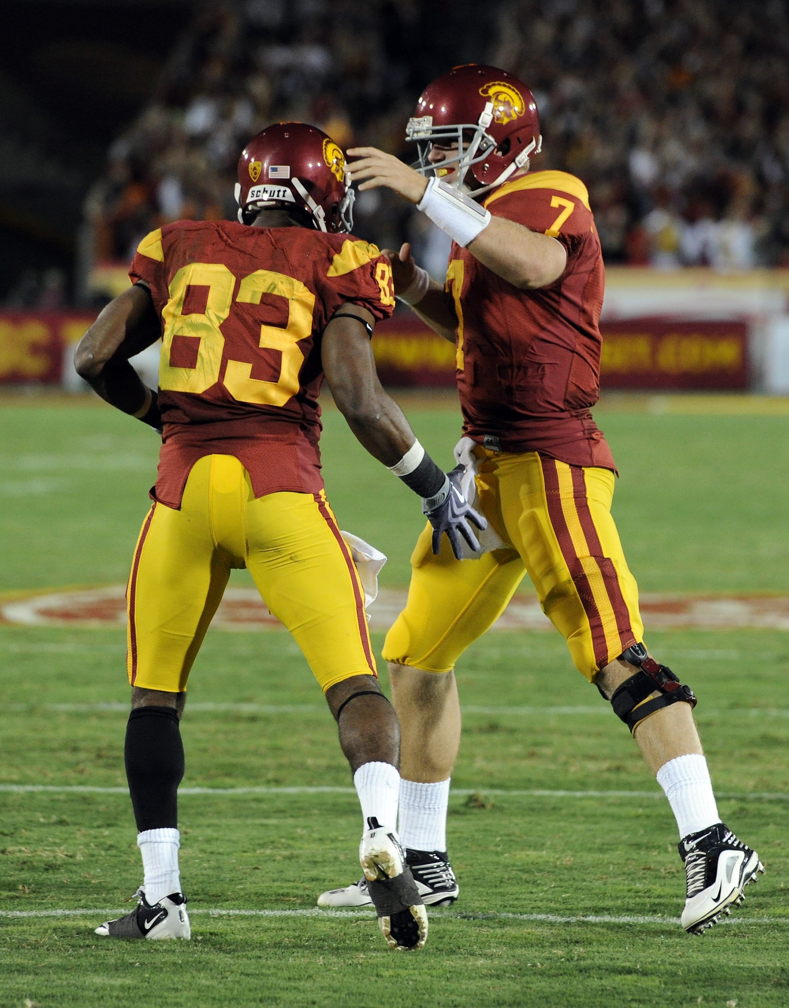 LOS ANGELES, CA - OCTOBER 30:  Matt Barkley #7 and Ronald Johnson #83 of USC Trojans celebrate a touchdown to trail 24-29 against the Oregon Ducks during the third quarter at Los Angeles Memorial Coliseum on October 30, 2010 in Los Angeles, California.  (