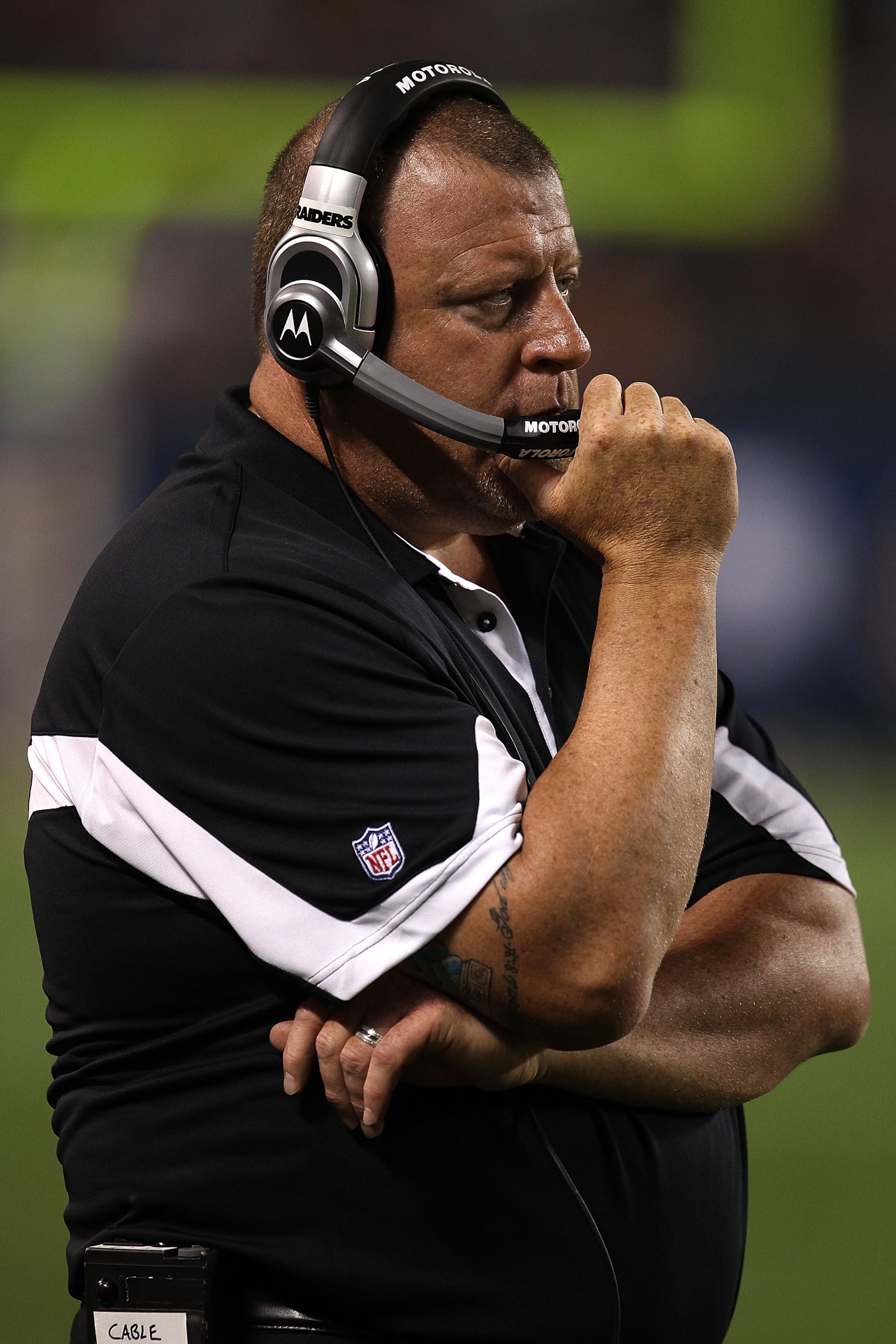 CHICAGO - AUGUST 21: Head coach Tom Cable of the Oakland Raiders watches as his team takes on the Chicago Bears during a preseason game at Soldier Field on August 21, 2010 in Chicago, Illinois. The Raiders defeated the Bears 32-17. (Photo by Jonathan Dani