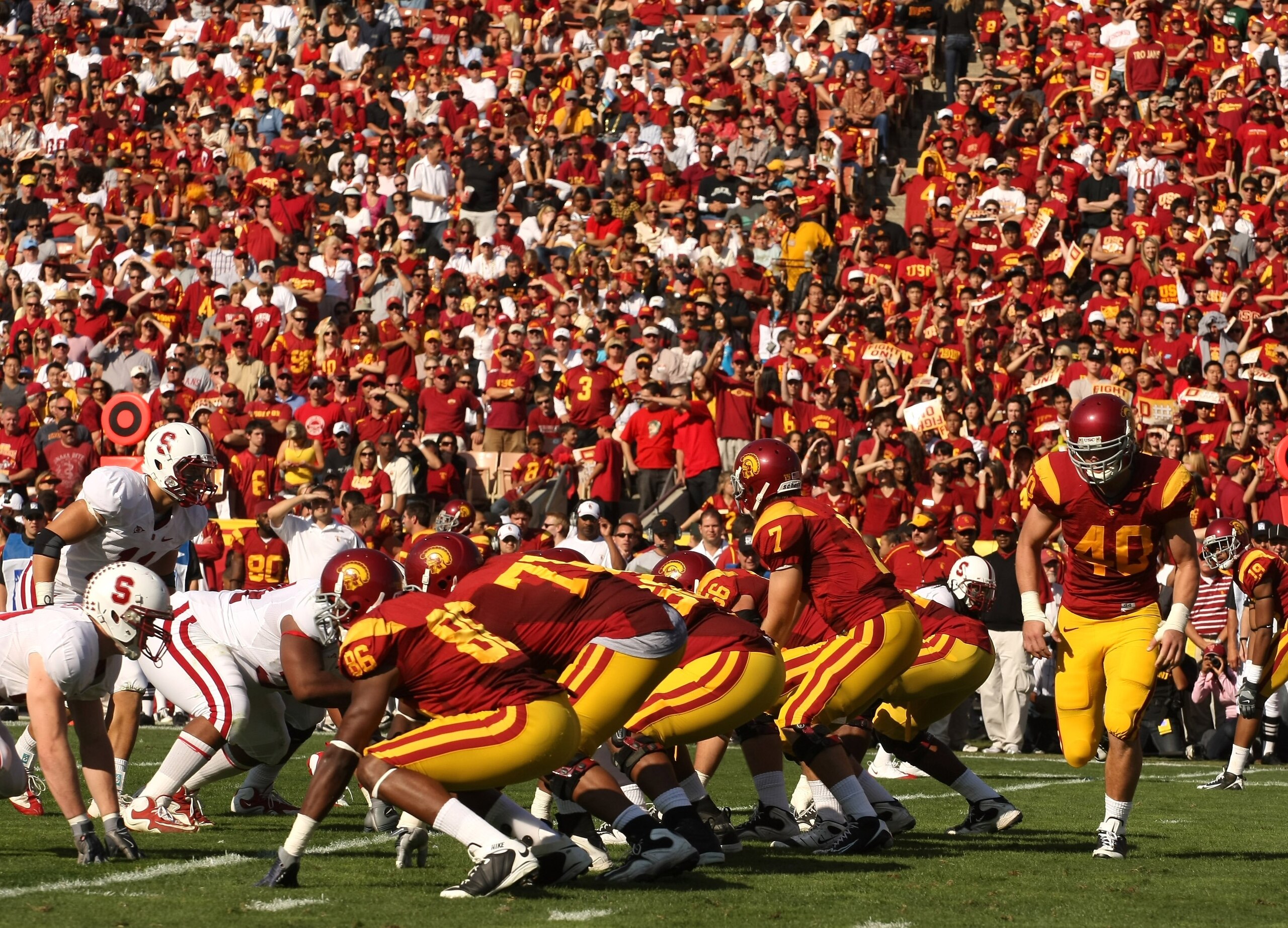 LOS ANGELES, CA - NOVEMBER 14: The USC Trojans offense sets on the line of scrimmage against the Stanford Cardinal on November 14, 2009 at the Los Angeles Coliseum in Los Angeles, California. Stanford won 55-21. (Photo by Stephen Dunn/Getty Images) LOS ANGELES, CA - NOVEMBER 14: The USC Trojans offense sets on the line of scrimmage against the Stanford Cardinal on November 14, 2009 at the Los Angeles Coliseum in Los Angeles, California. Stanford won 55-21. (Photo by Stephen Dunn/Getty Images)