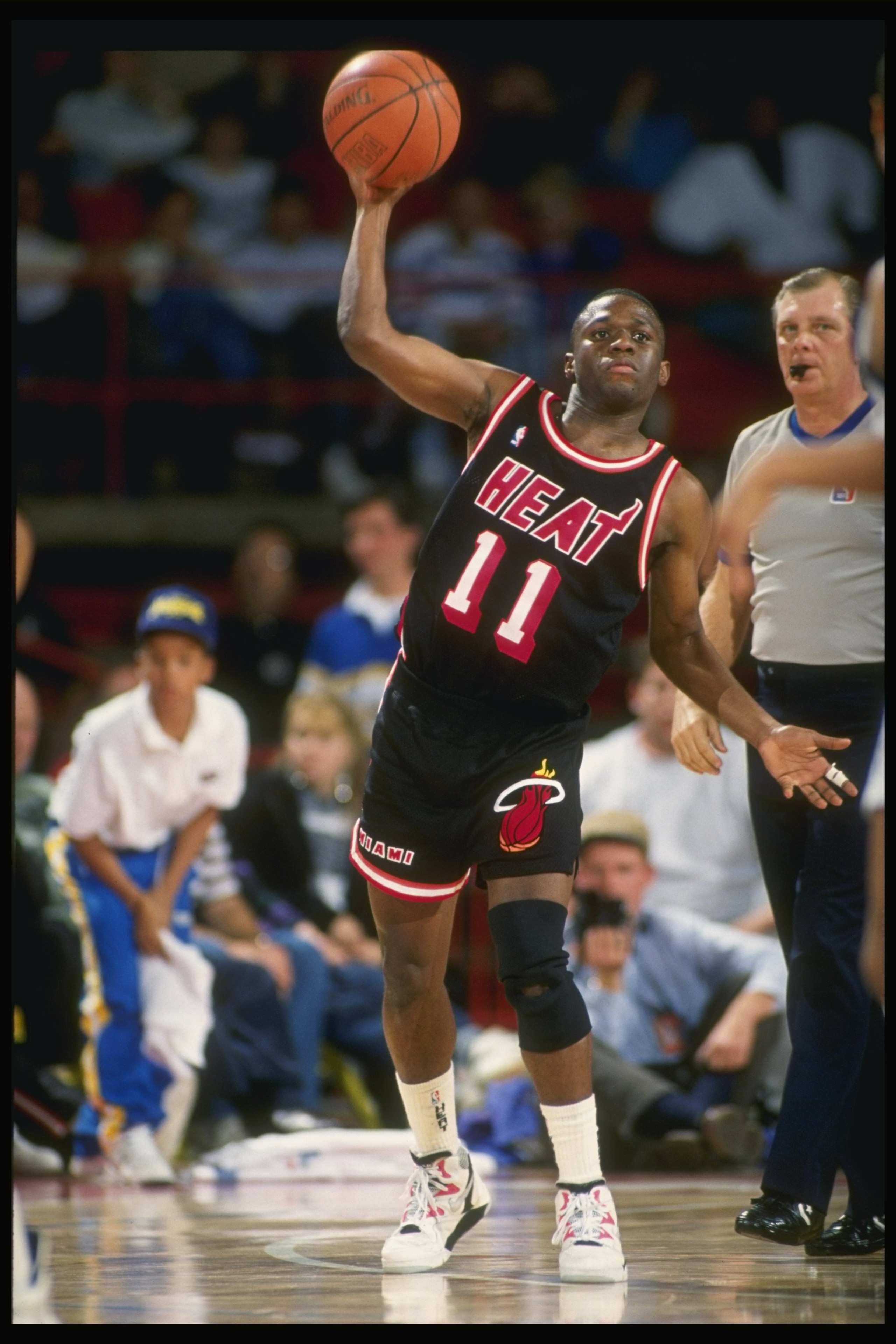 1990:  Guard Sherman Douglas of the Miami Heat in action with the ball during a game versus the Denver Nuggets at the McNichols Arena in Denver, Colorado. Mandatory Credit: Tim de Frisco  /Allsport