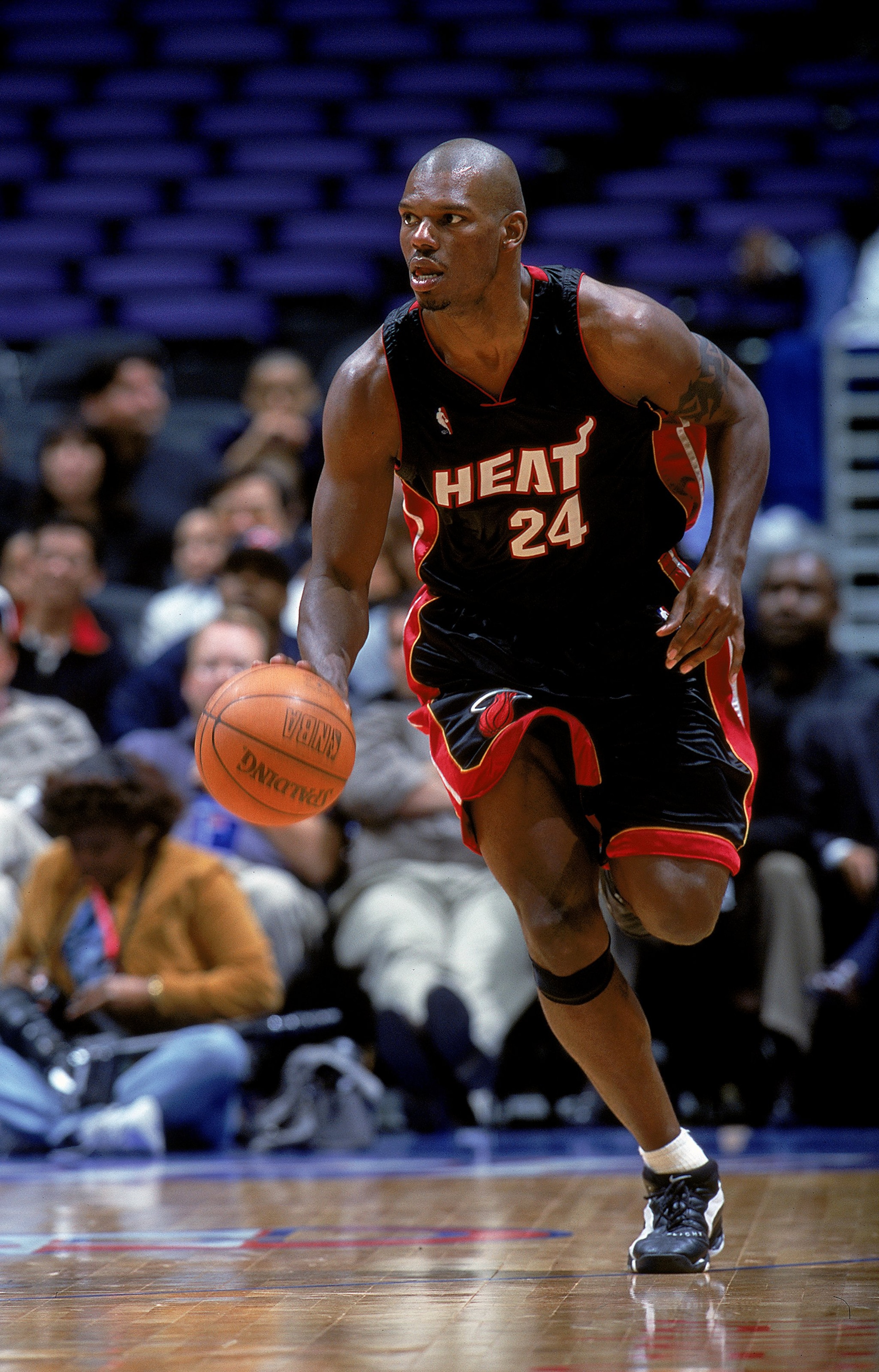 6 Dec 1999: Jamal Mashburn #24 of the Miami Heat dribbles down the court during a game against the Los Angeles Clippers at the Staples Center in Los Angeles, California. The Heat defeated the Clippers 99-91.