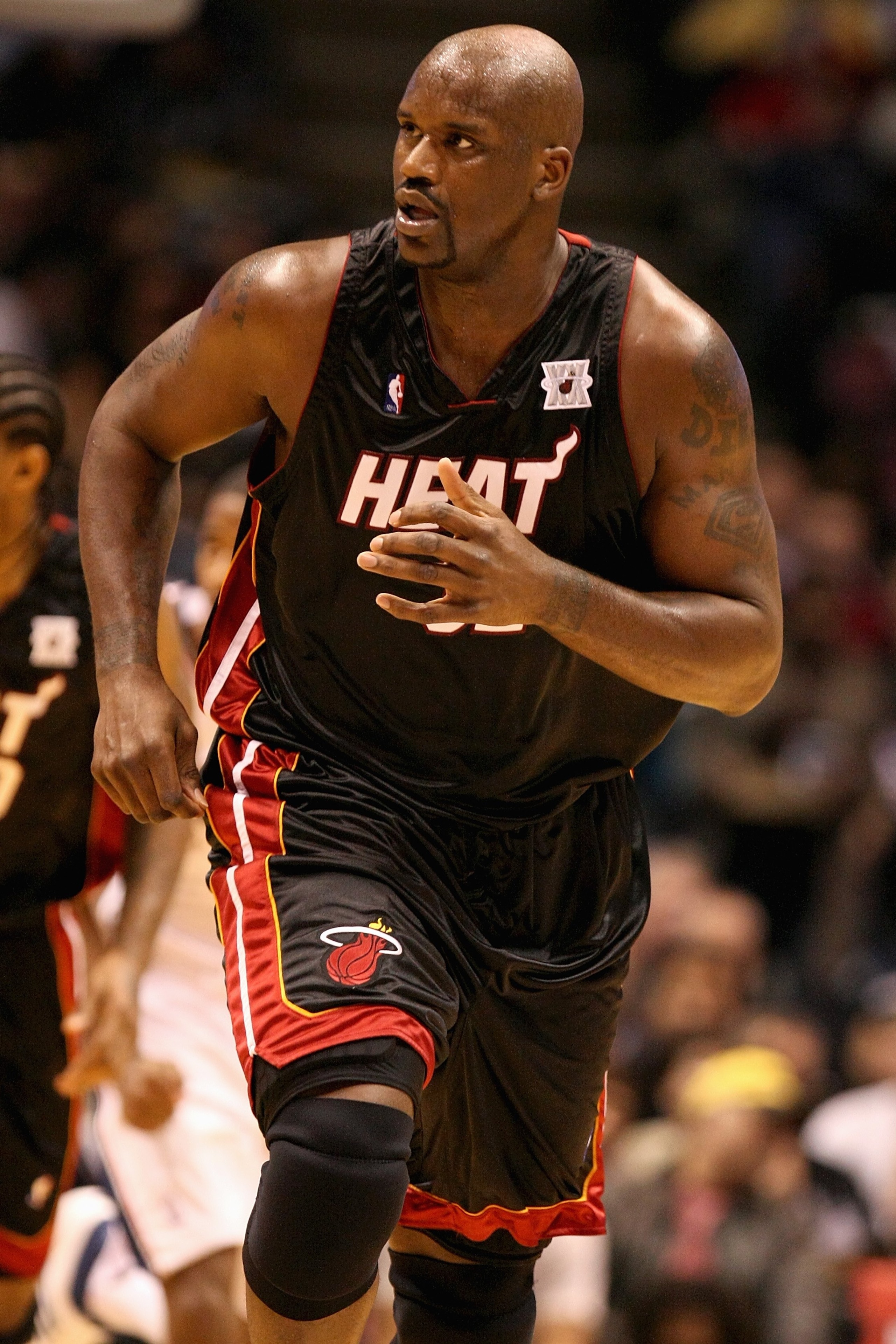 EAST RUTHERFORD, NJ - NOVEMBER 17:  Shaquille O'Neal #32 of the Miami Heat runs upcourt during the game against the New Jersey Nets on November 17, 2007 at the Izod Arena in East Rutherford, New Jersey.  The Heat won 91-87.  NOTE TO USER: User expressly a